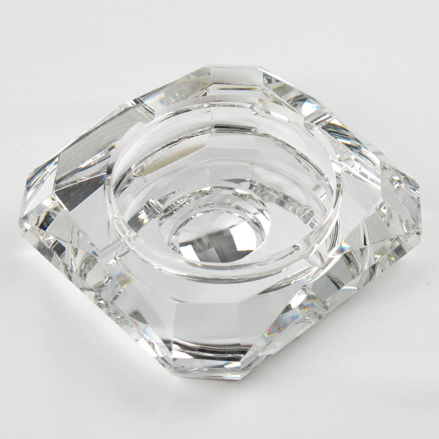 Stunning large Art Deco mirrored glass cigar ashtray or desk tidy or vide poche attributed to French designer Jean Luce. Extra thick crystal clear glass slab with mirror finish underside, square shape with cut corners and deep geometric faceted