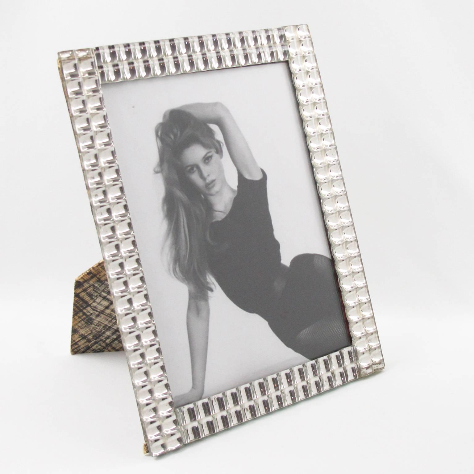 Mid-Century Modern mirror picture photo frame. Lovely sides build with tiny little domed square mirrors with metallic Kinetic effect. Picture frame can be placed either in portrait or in landscape position. Easel at the back. France, circa 1950s.