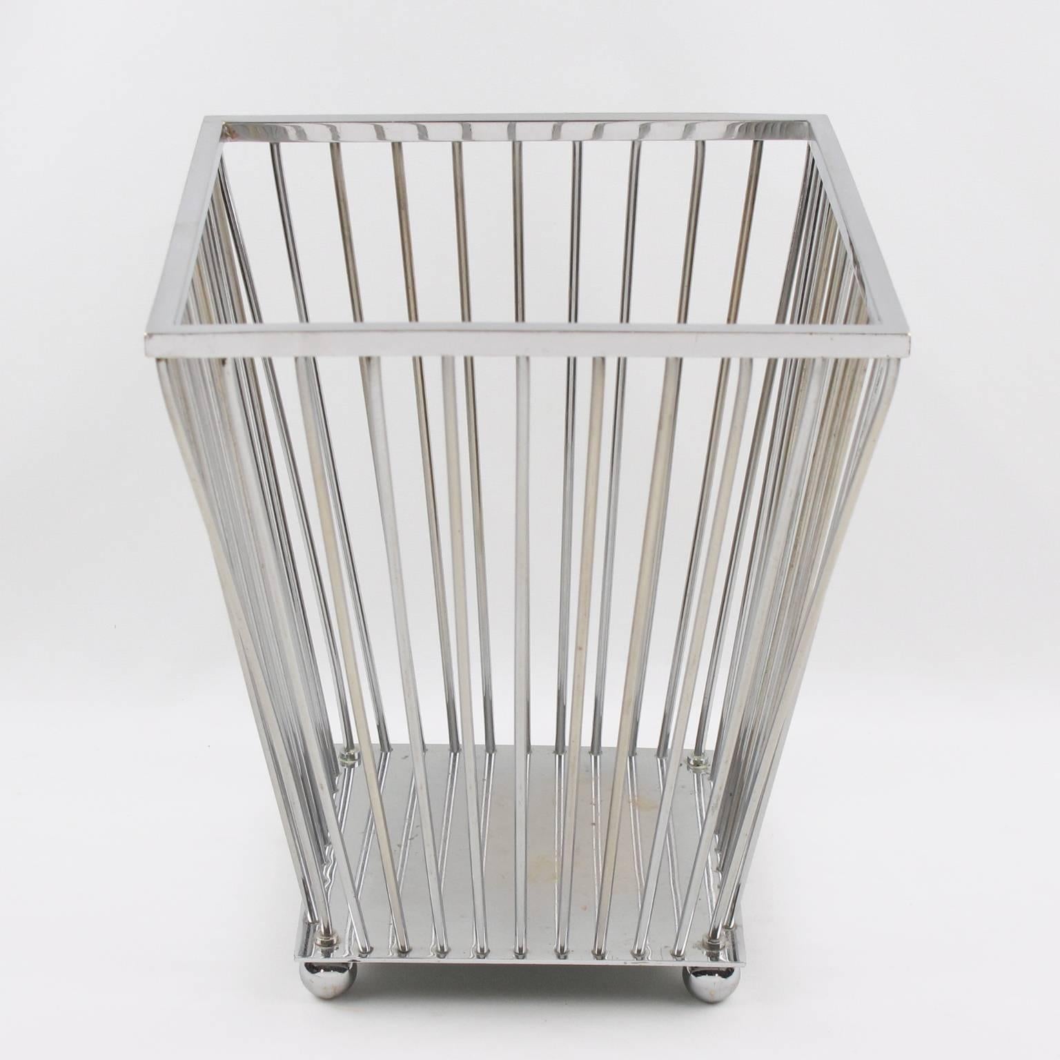 Elegant Art Deco modernist heavy chromed metal desk accessory, office waste basket by French Designer Jacques Adnet (1900 - 1984). Minimalist geometric square shape, typical Art Deco design with slims columns resting on a square base with tiny bead