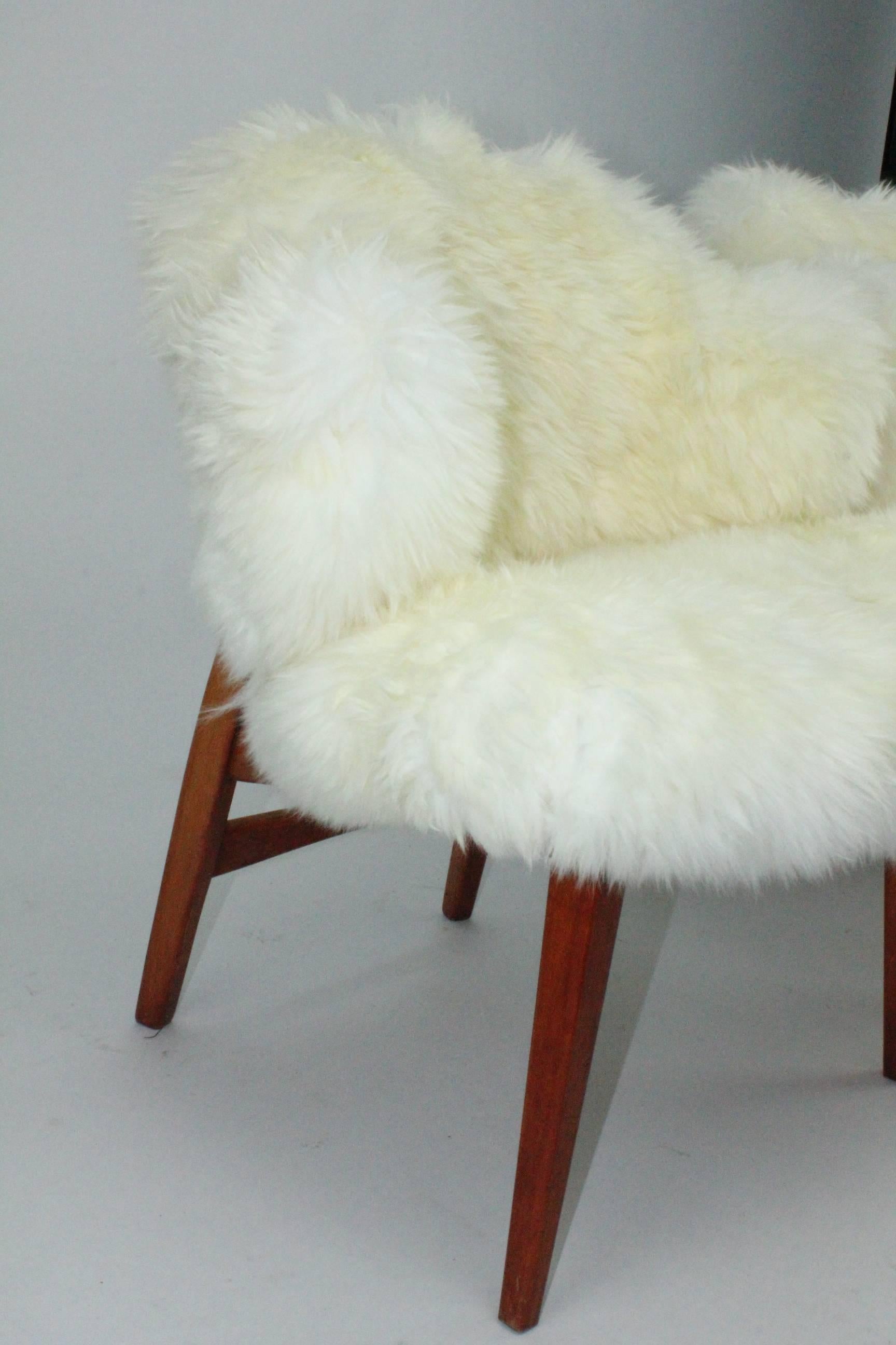 20th Century Pair of Ib Kofod-Larsen Shell Chairs Dressed in Swedish Long Haired Sheepskin