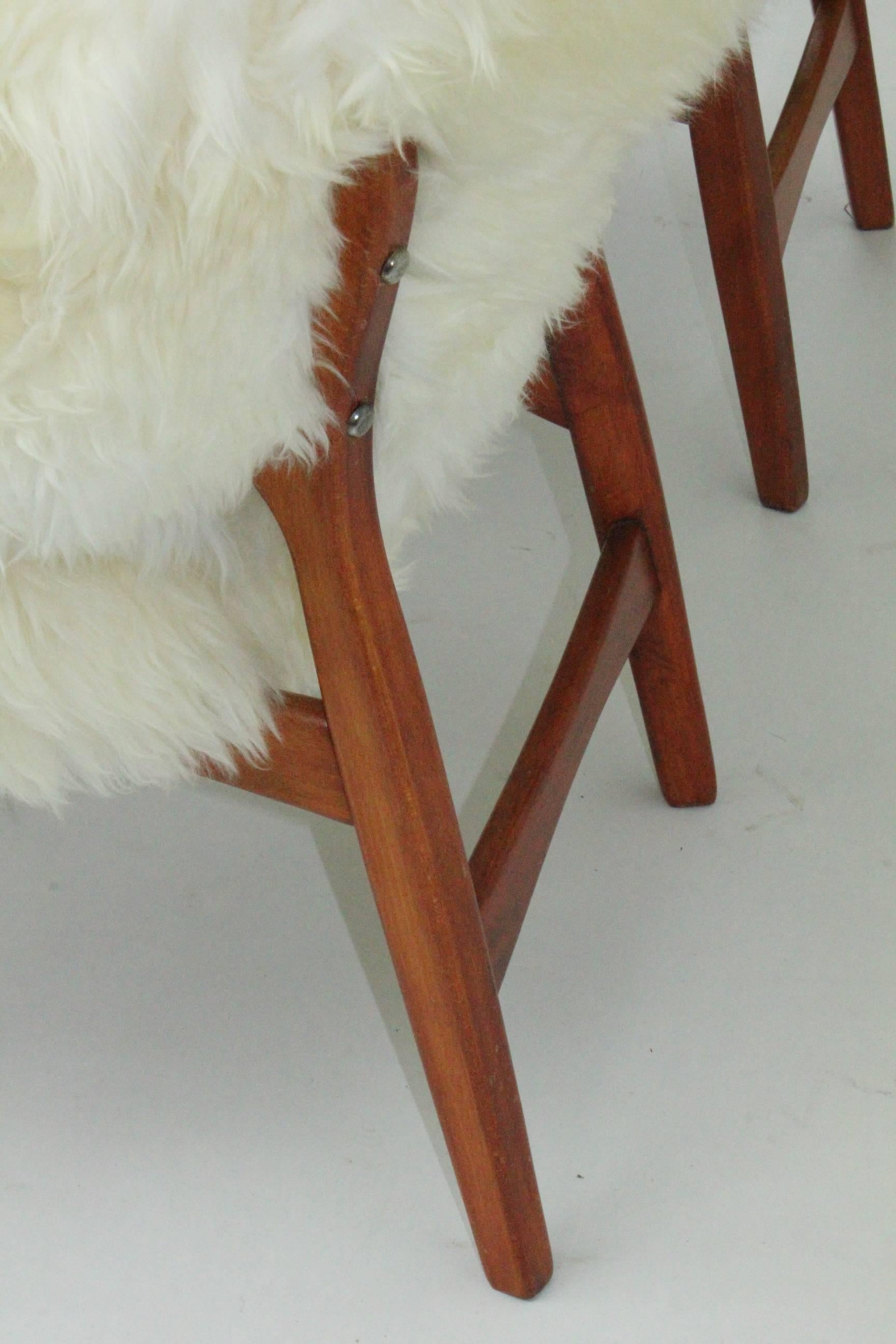 Brass Pair of Ib Kofod-Larsen Shell Chairs Dressed in Swedish Long Haired Sheepskin