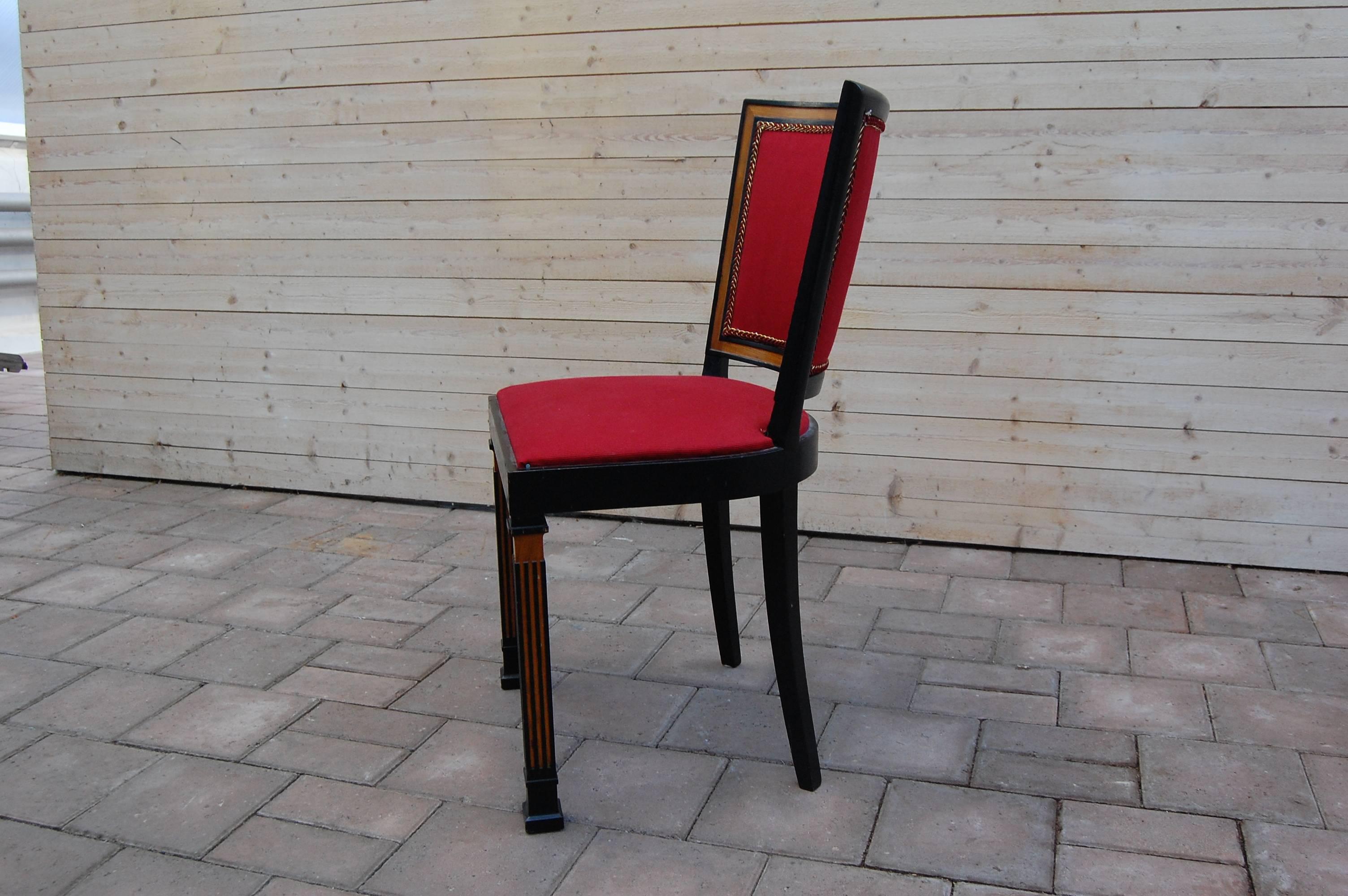 The chairs is made at Chambert Möbelfabrik. They are blackened, and the wood is walnut.