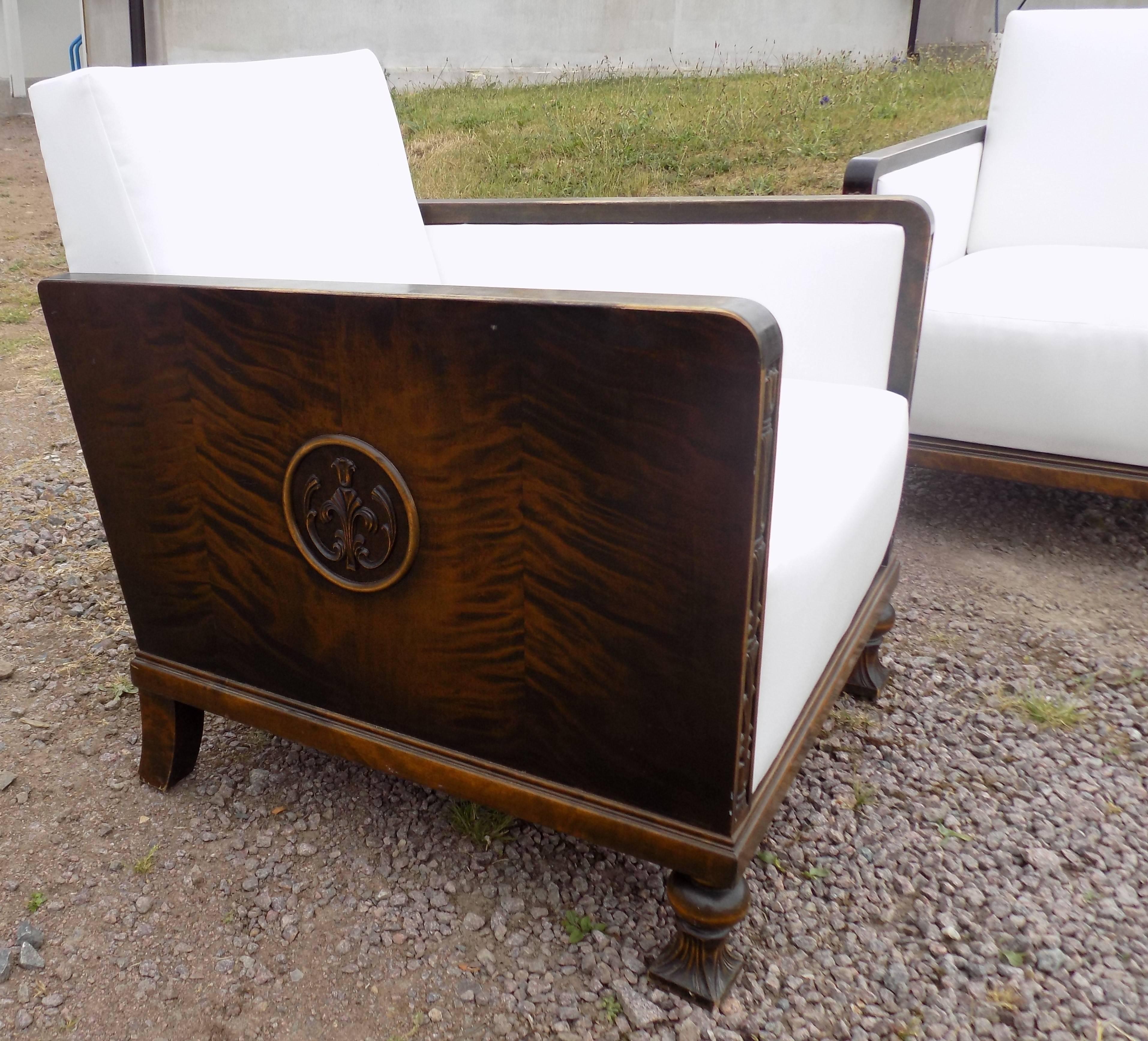Great pair in both style and comfort, Swedish Grace period club chairs circa 1920, sides covered in stained Birch. Newly upholstered.

Please contact us for international shipping prices.