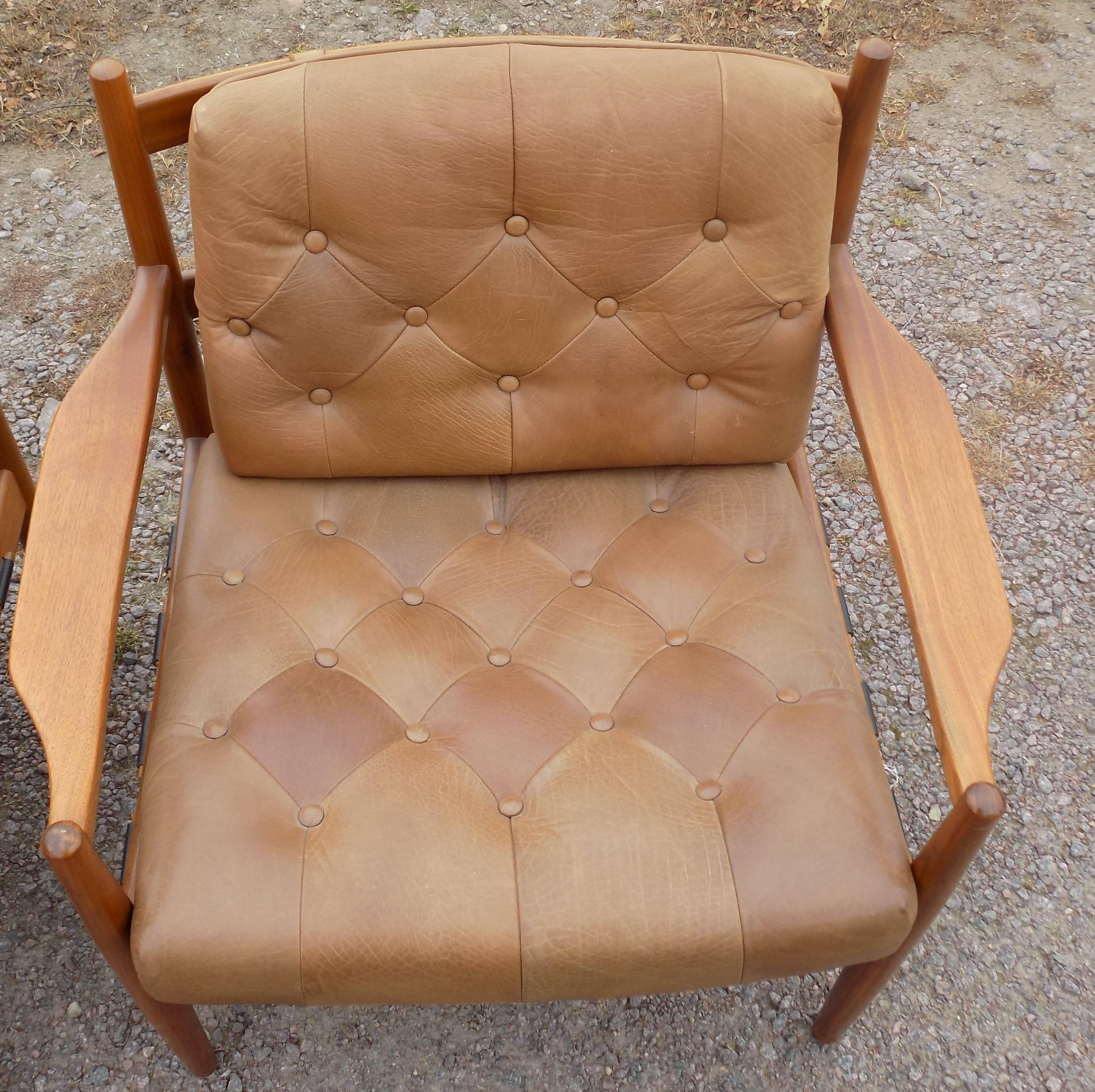 A pair of Midcentury armchairs "Lacko" by Ingemar Thillmark for OPE Mobler Jonkoping Sweden. Original buffalo leather in great condition. Please contact us for more pictures or questions about international freight.