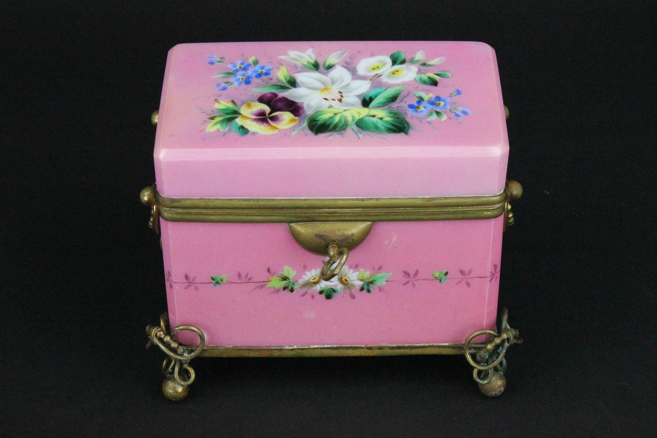 Beautifully painted opaline glass box. Painted with flowers all-over. Good original condition.
With key.