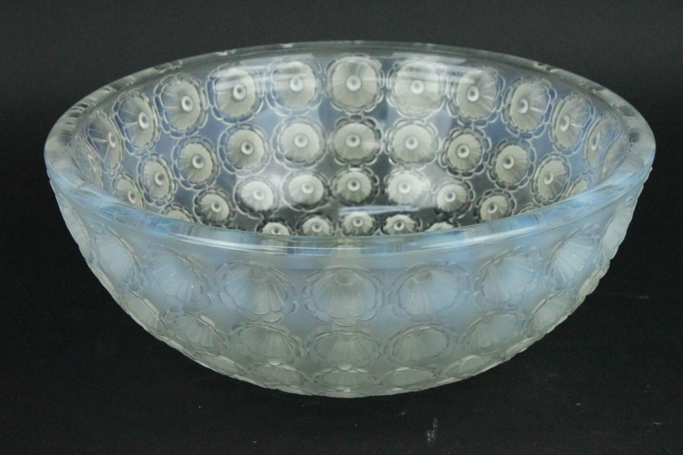 This early post war Nemours bowl has got a nice opalescence and is also frosted. It is acid stamped 'Lalique France'. Perfect condition.