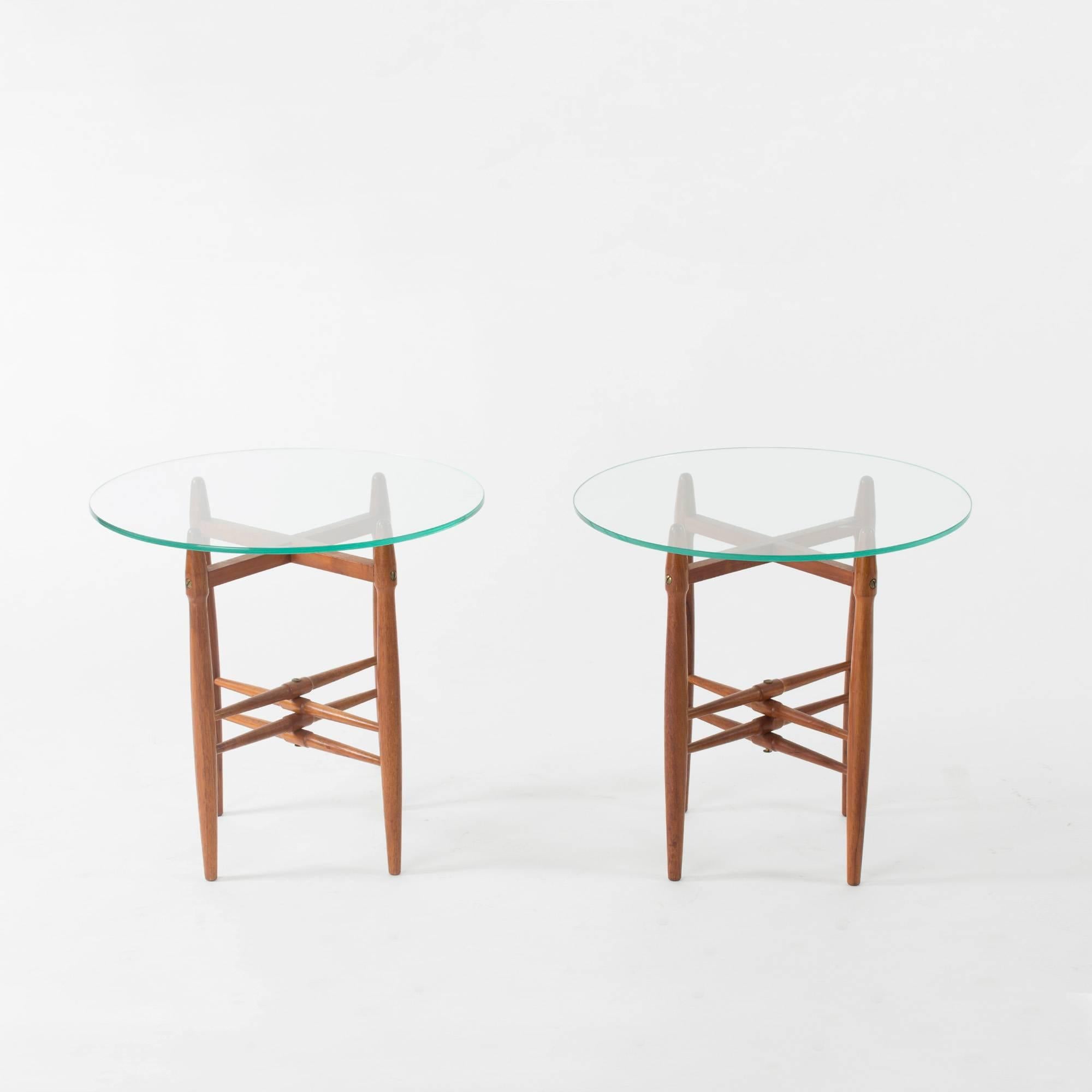 Pair of mahogany side tables with round green tinted glass tops by Poul Hundevad. Beautifully sculpted legs.