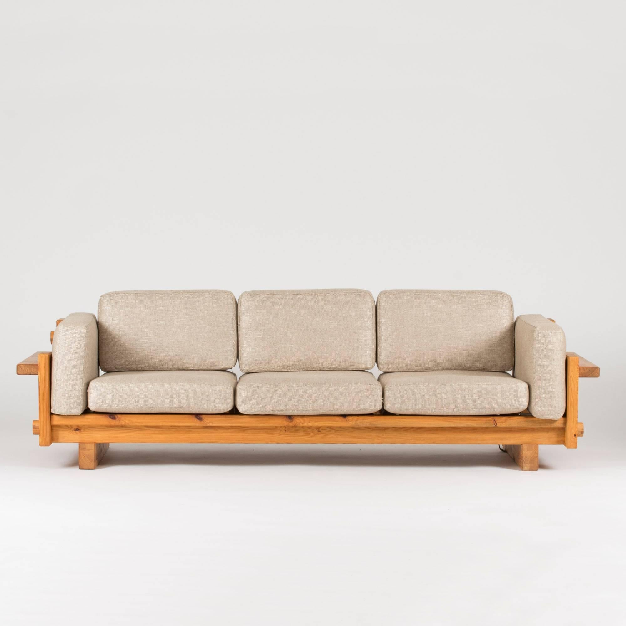 Sturdy, chunky solid pine sofa by Yngve Ekström for Swedese, made in the 1970s. Removable cushions with sand-colored, linen fabric.