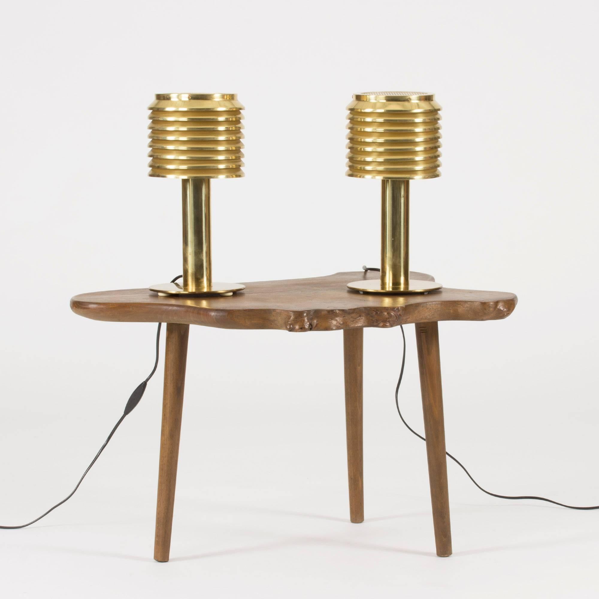 Pair of incredibly cool brass table lamps by Hans-Agne Jakobsson. Brass lamellas are stacked in a tight design and the light is shielded at the top by perforated spheres.