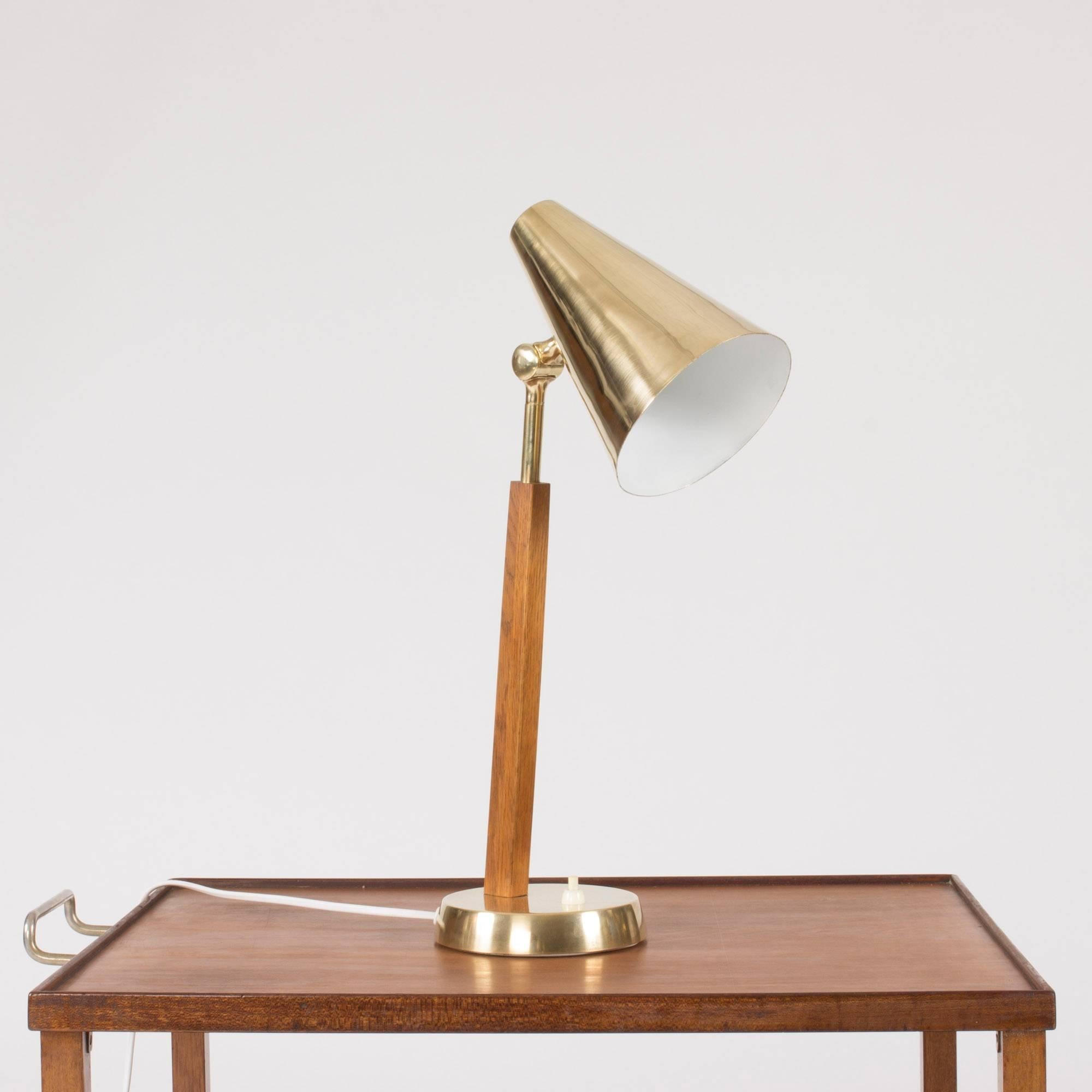 Superb brass desk lamp with teak handle from Falkenbergs Belysning. Great materials and proportions.