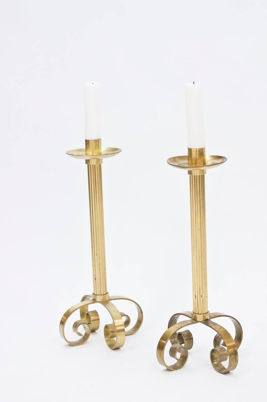 Pair of extravagant brass floor candlesticks from Ystad Metall, made in the 1940s.