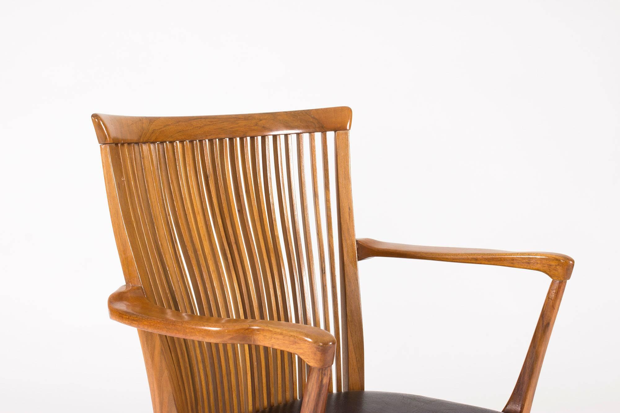 Mid-20th Century Walnut and Leather Armchair by Carl-Axel Acking