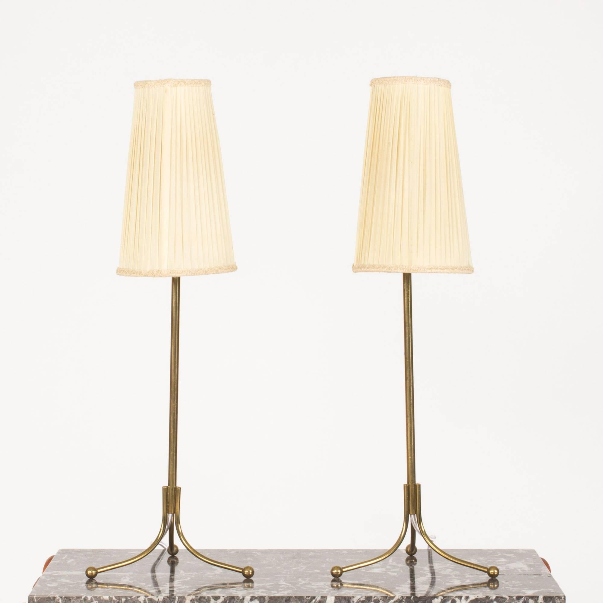 Very rare table lamps by Josef Frank, made in a small number in the 1930s. The model is a table size version of the 2326 floor lamp by Frank. The lamps remain in original condition except for the wiring, which has been remade. Original shades, can