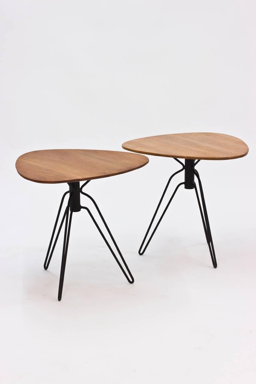 Rare teak and black lacquered metal end tables in a progressive design by Hans Agne Jakobsson.