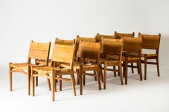 Set of Ten Oak and Rattan Dining Chairs by Hans J. Wegner, Denmark, 1950/60s