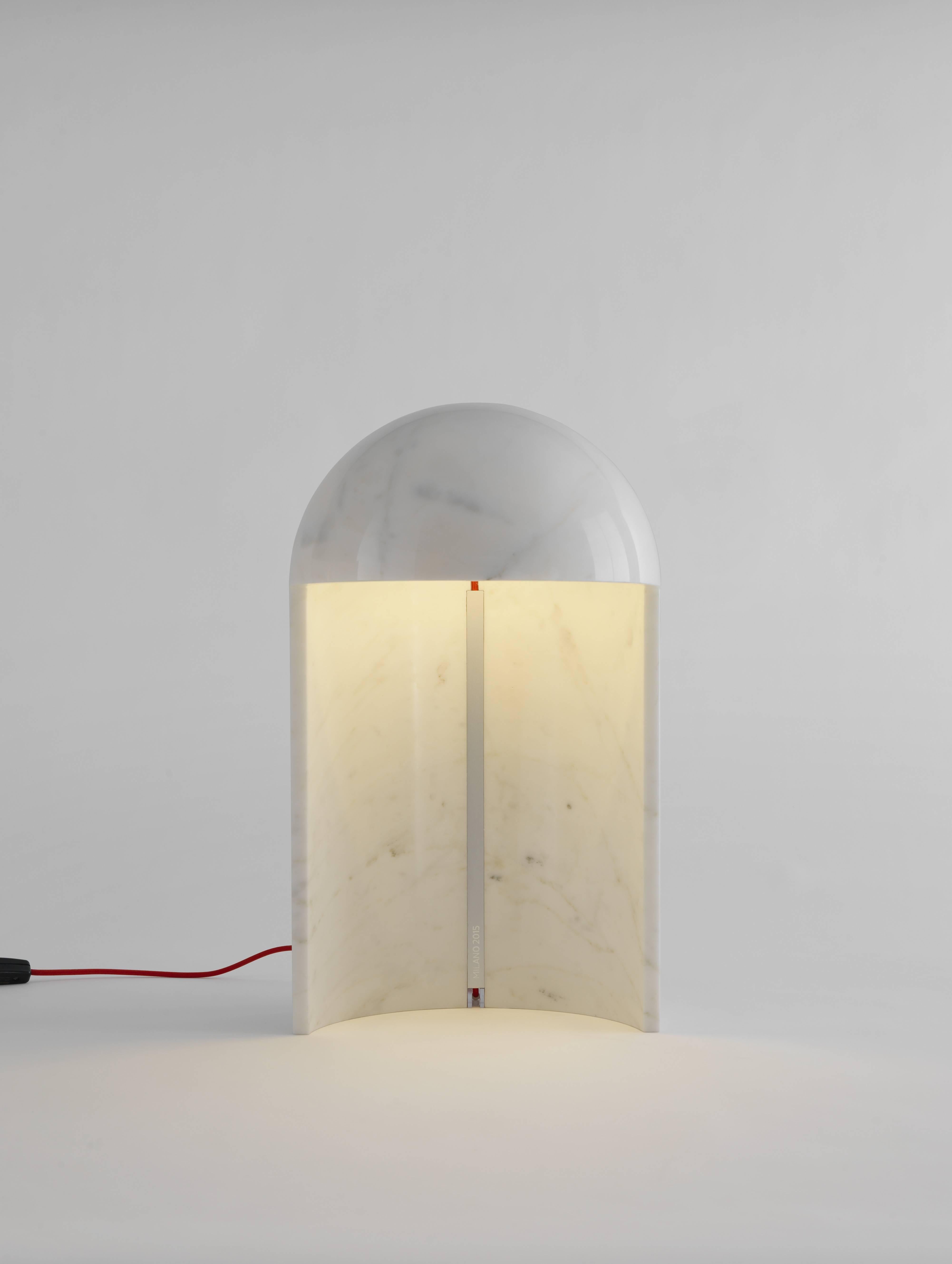 Table lamp designed by Carlo Colombo and made from the finest and most valuable Carrara marble. The lamp has a LED board that glows with magical light, enhancing the veins in the marble.

Dimensions: Ø 32 x 55 cm
Bulbs: 17,5W LED (230V) 3000K