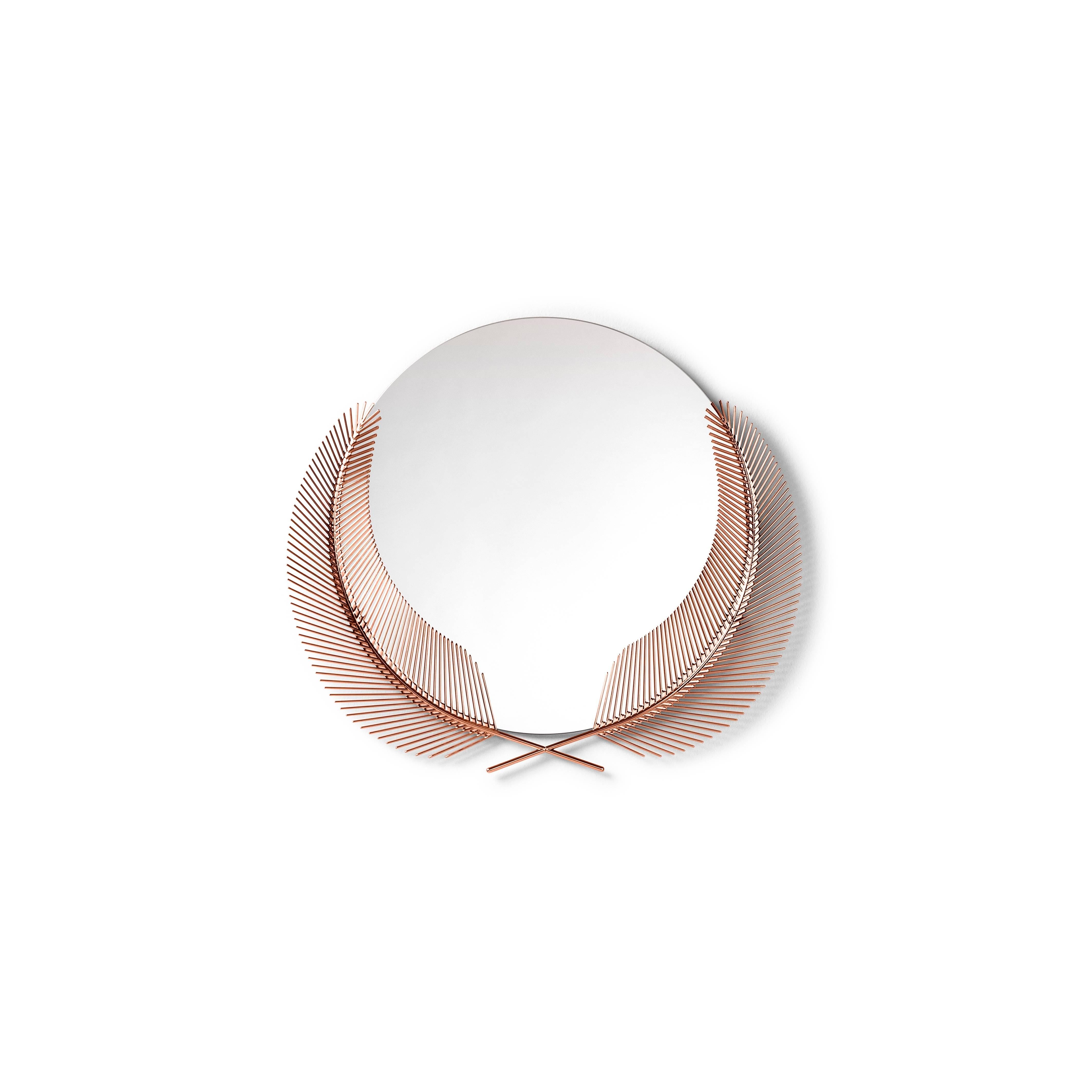 Sunset rose gold mirror designed by Nika Zupanc for Ghidini 1961.

 