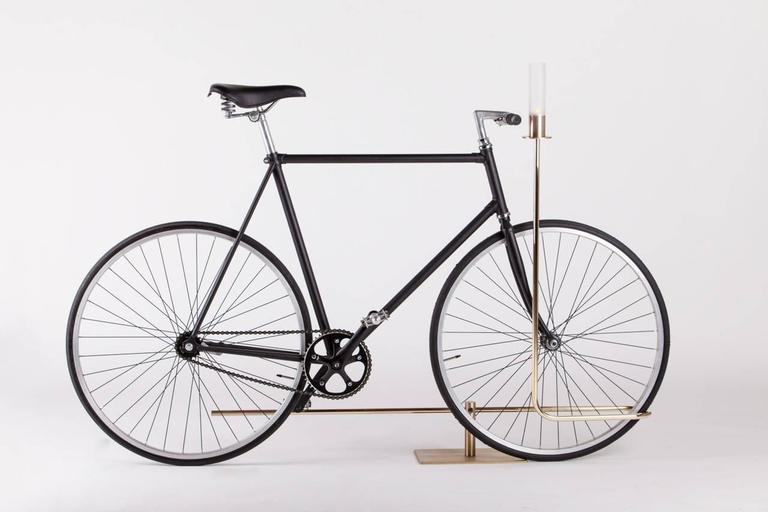 Bi-Track is an elegant parking stand for bicycles. 
Won WALLPAPER AWARD 2016

Designed by Masanori Mori for Mingardo, It can be used both in public and private spaces, recognizable as a sign and symbol. It is made by one simple line and it