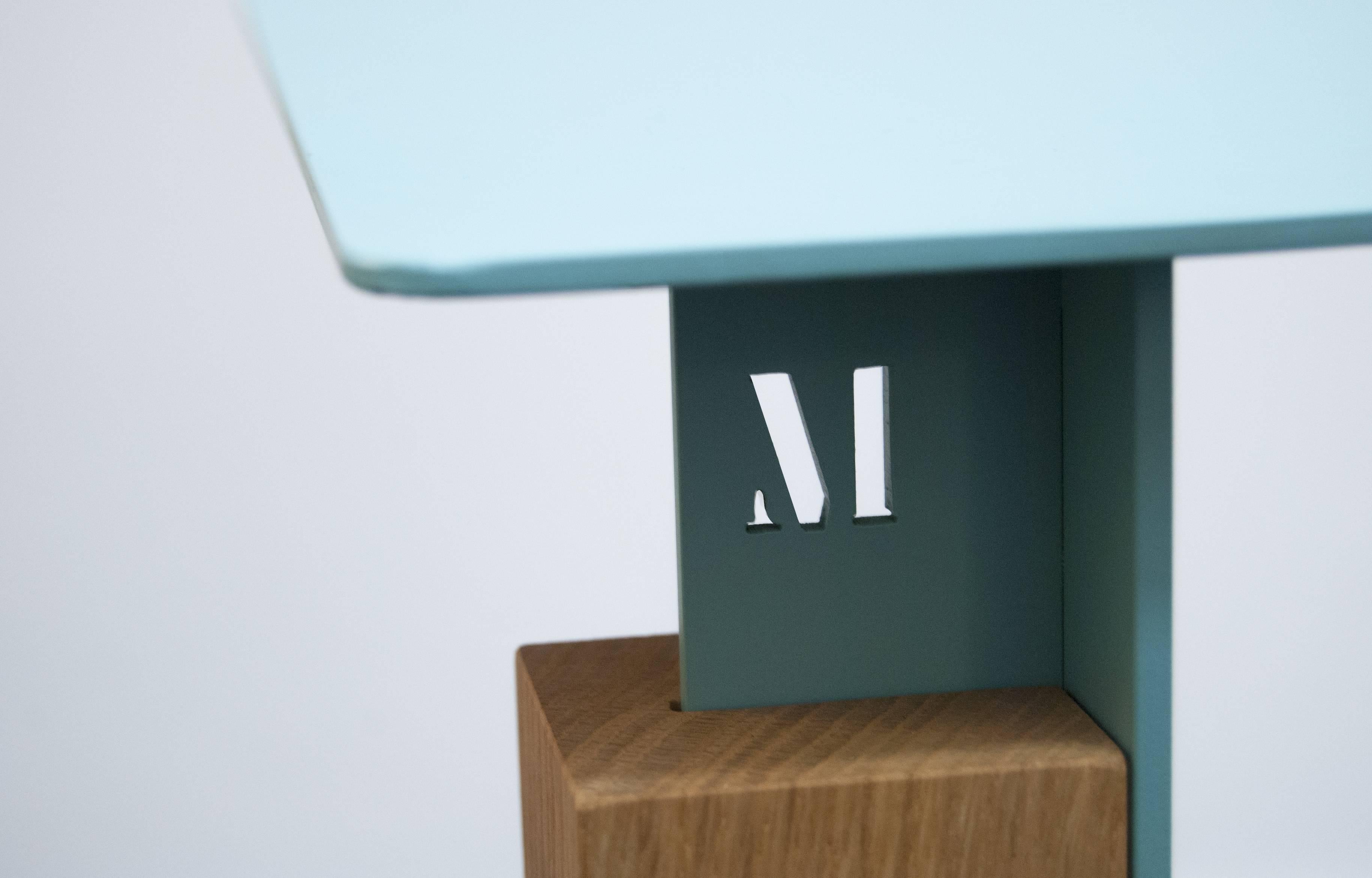Inspired by metal structures for architecture, slide is a side table in metal and solid wood that combines design and craftsmanship. The metal parts compose the structure and the surface, while the wood is the connection between the
top and bottom