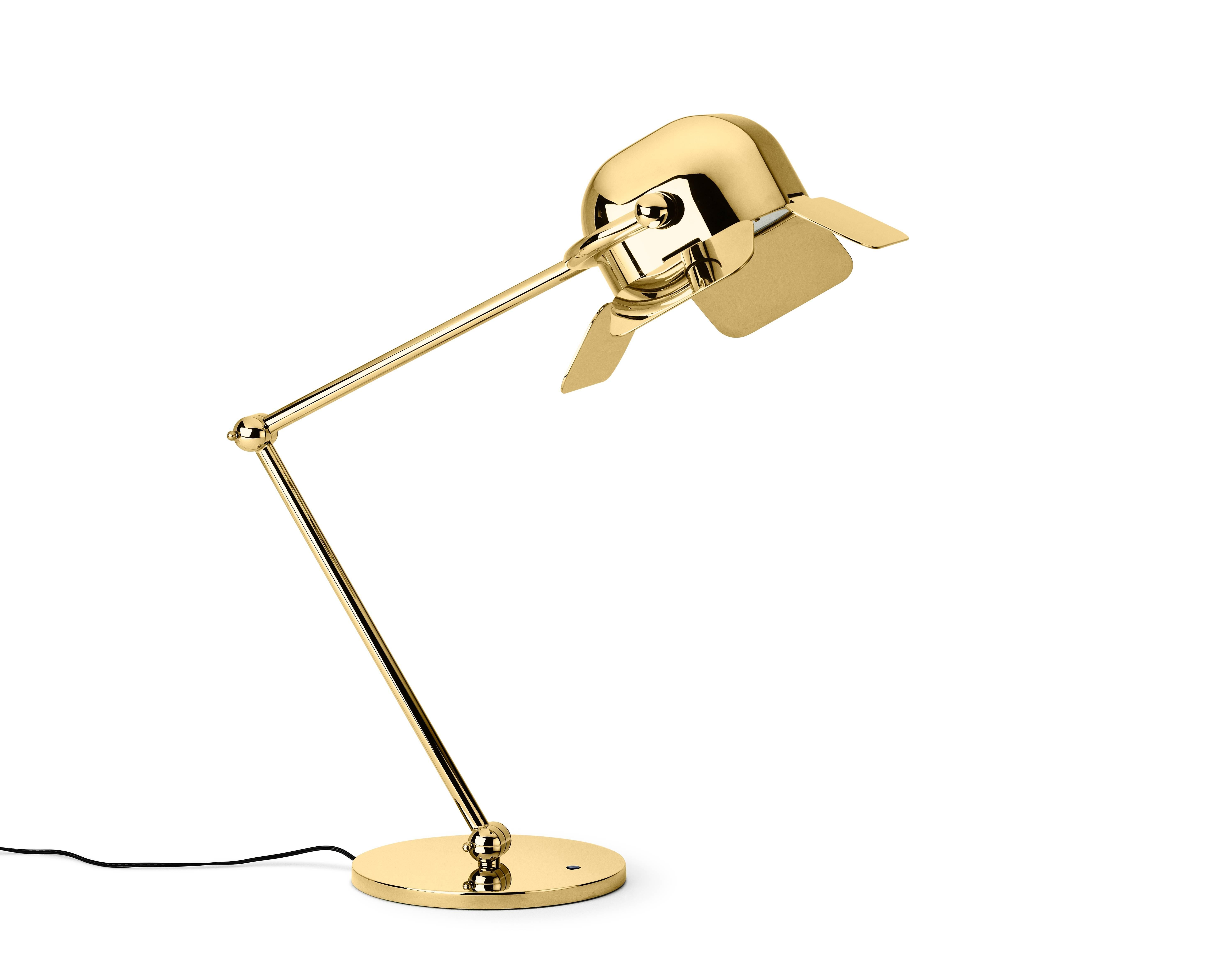 Table lamp in polished brass designed by Nika Zupanc.