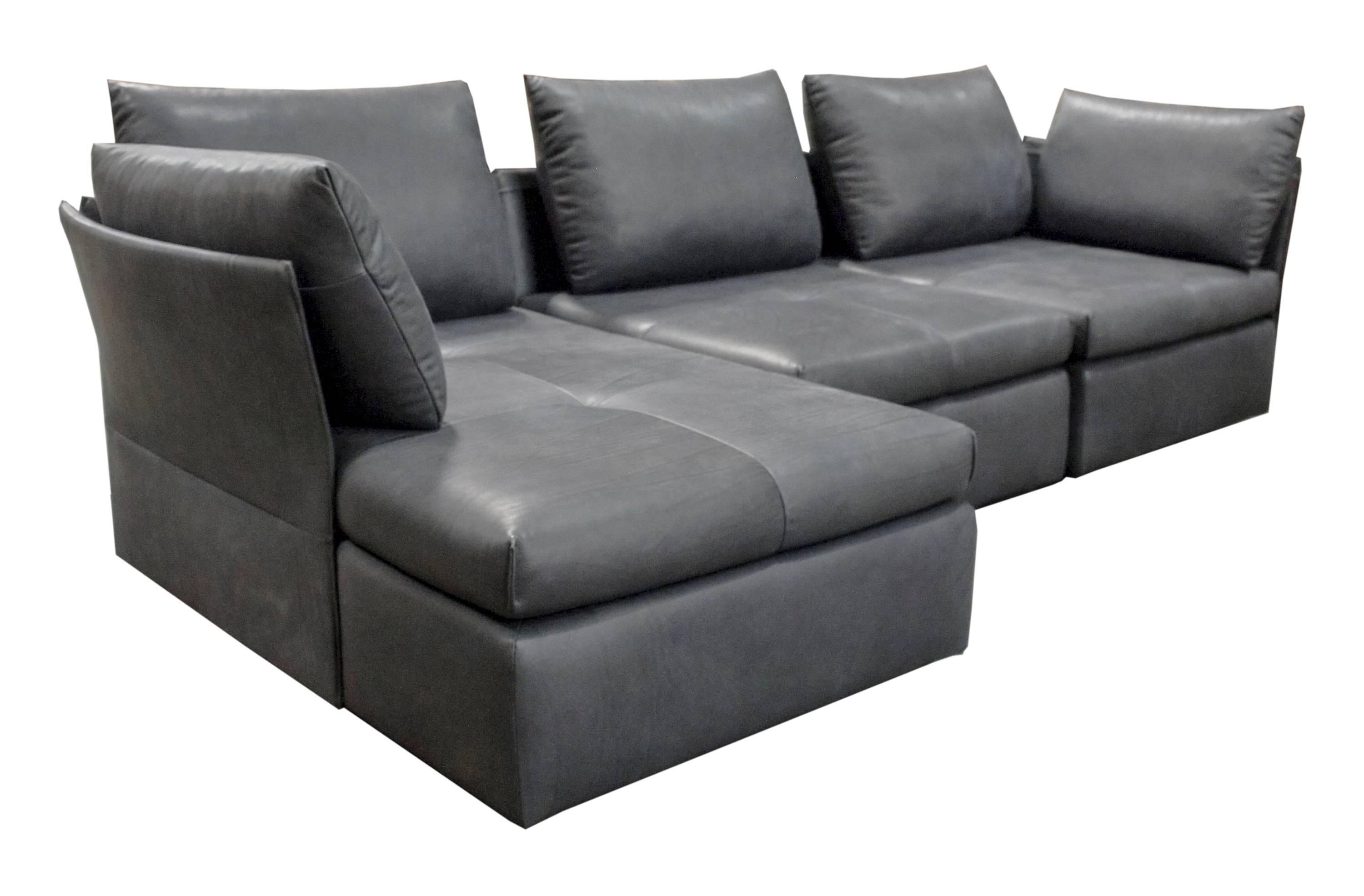 DS-19 de Sede sofa designed by Christian Werner in black natural leather.

Solid wood construction, backs with flat steel profiles.
Seat with webbing under-springing.
SEDEX upholstery with Dacron covering.
Back and armrest cushions: