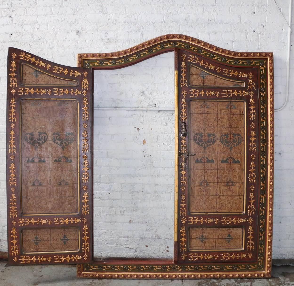 Wooden double doors with jambs painted with decorative motifs.
Manufactured in Morocco for an New York Essex House apartment, never used.
Jambs height 75in; total width 61in; depth 5in.

  