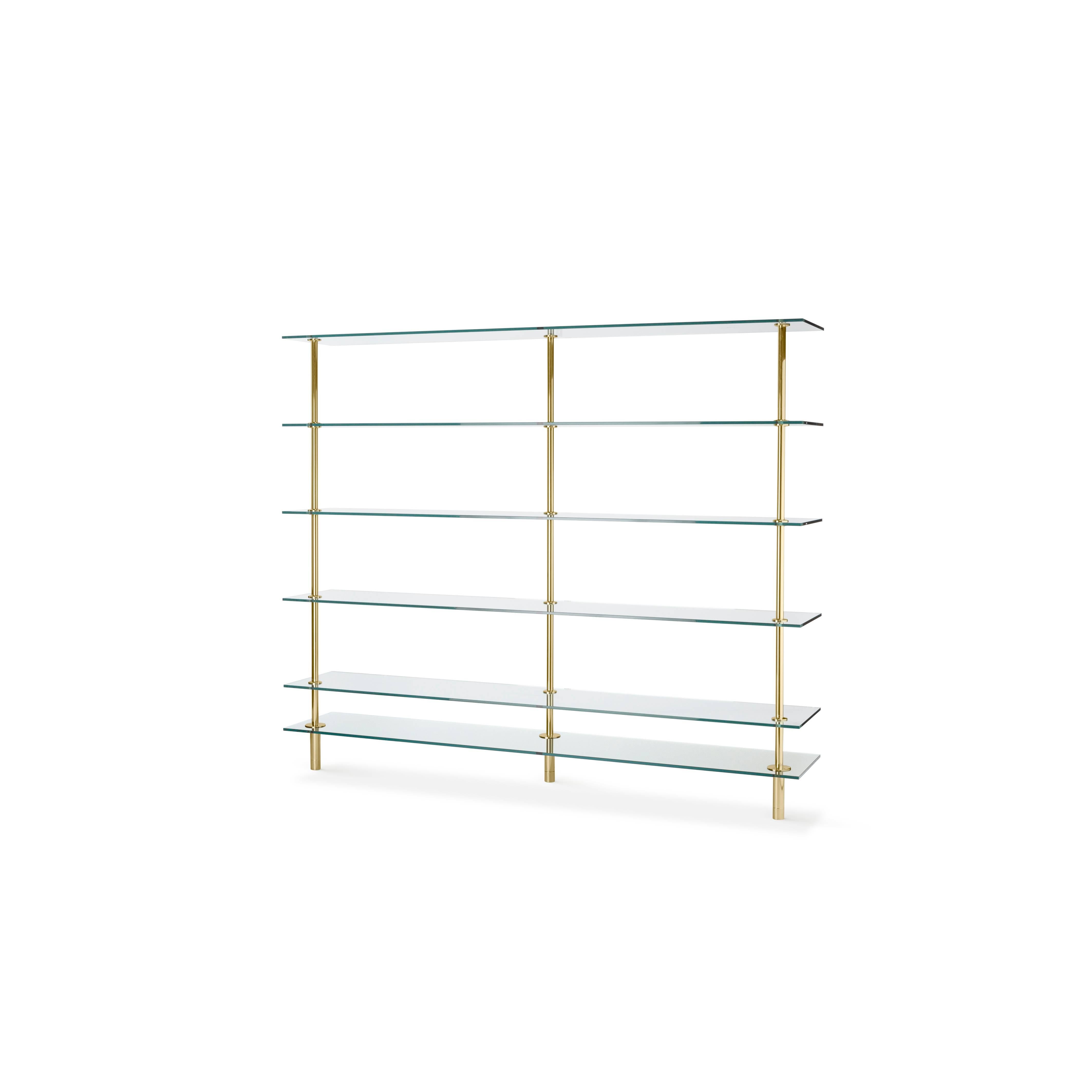 Legs bookcase polished brass and crystal designed by Paolo Rizzatto for Ghidini, 1961.

Measures: 225 x 40 x 190 H cm.