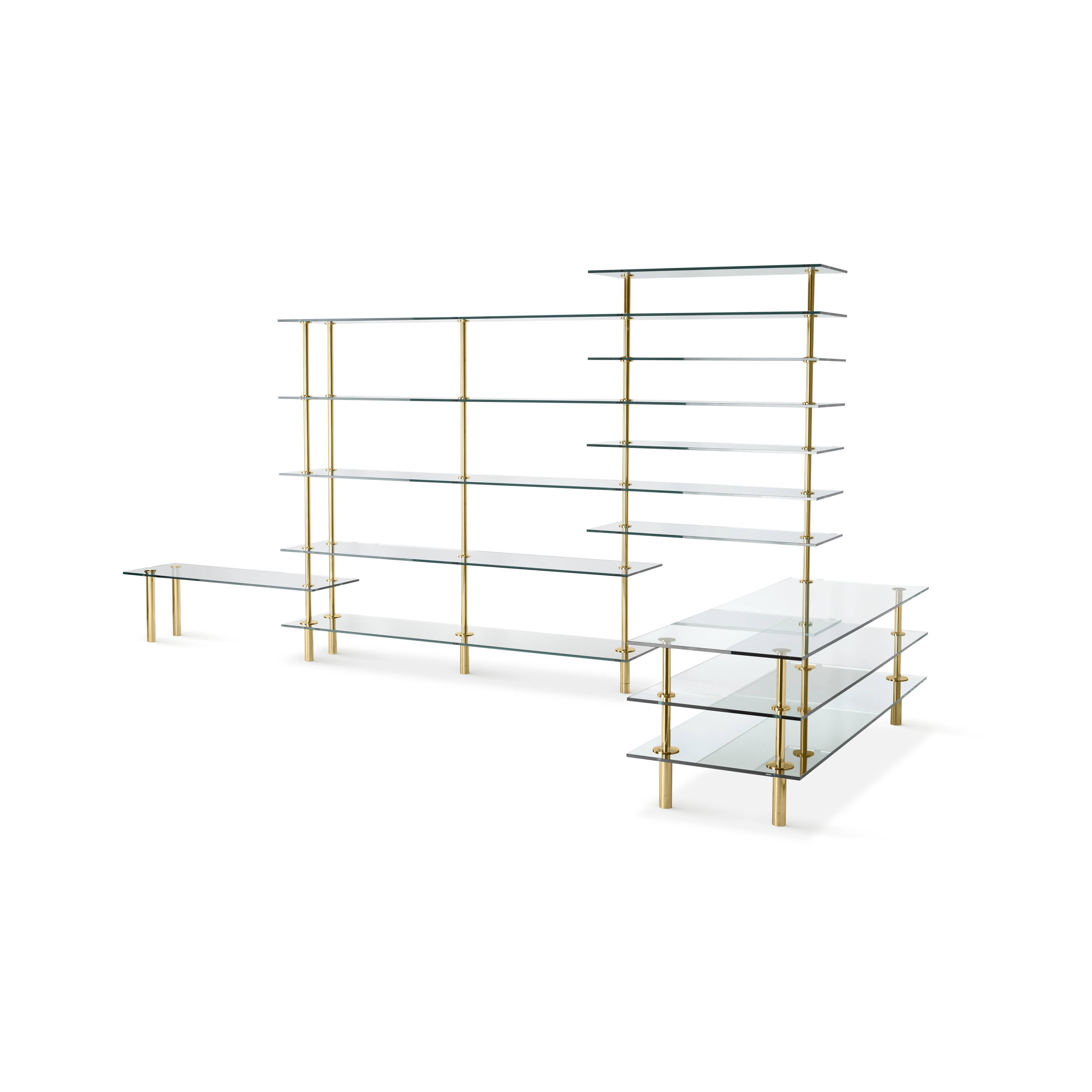 Legs crystal and polished brass angular bookcase designed by Paolo Rizzatto for Ghidini, 1961

Dimensions: 420 x 171 x 40 x 90H cm.