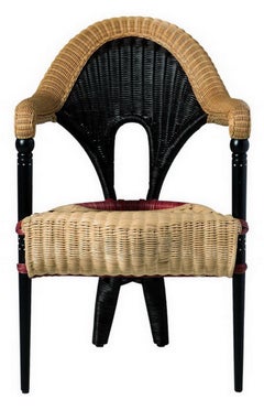 Poltrona "Liba" in rattan rivestito in canna naturale disegnata da Borek Sipek per Driade