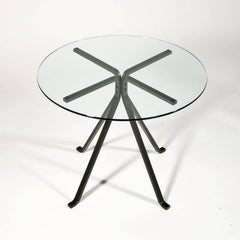 Mesa de comedor de cristal templado y acero pintado "Cugino" de Enzo Mari para Driade