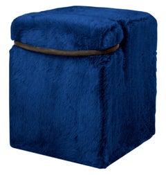 "Blocco" Puf de piel sintética fucsia o azul diseñado por Nanda Vigo para Driade