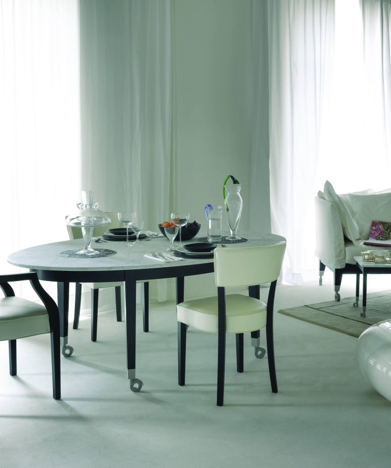 "Neoz" Carrara Marble Castored Dining Table Designed by P ...