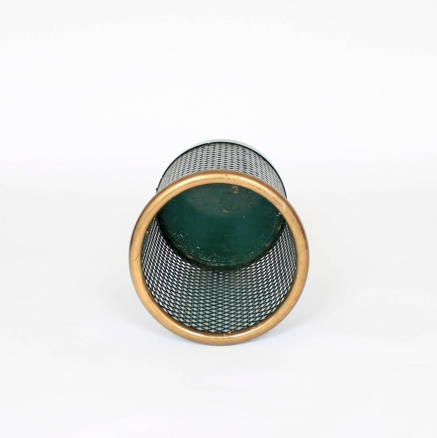 An old green-lacquered steel and brass waste basket from Sweden by Josef Frank for Svenskt Tenn from the 1940s. Delicately patinated and delightfully blemished. Perfect for a stylish home office.