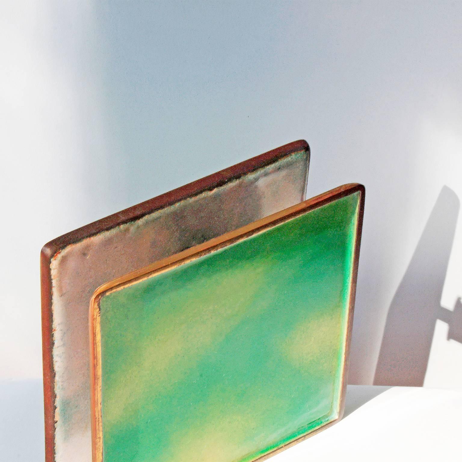 Spectacular door handles in hand-polished enamel on brass created in collaboration by two of Italy's most important 20th century designers, Gio Ponti and Paolo De Poli. This example features a fresh green glaze on the exterior surfaces and a