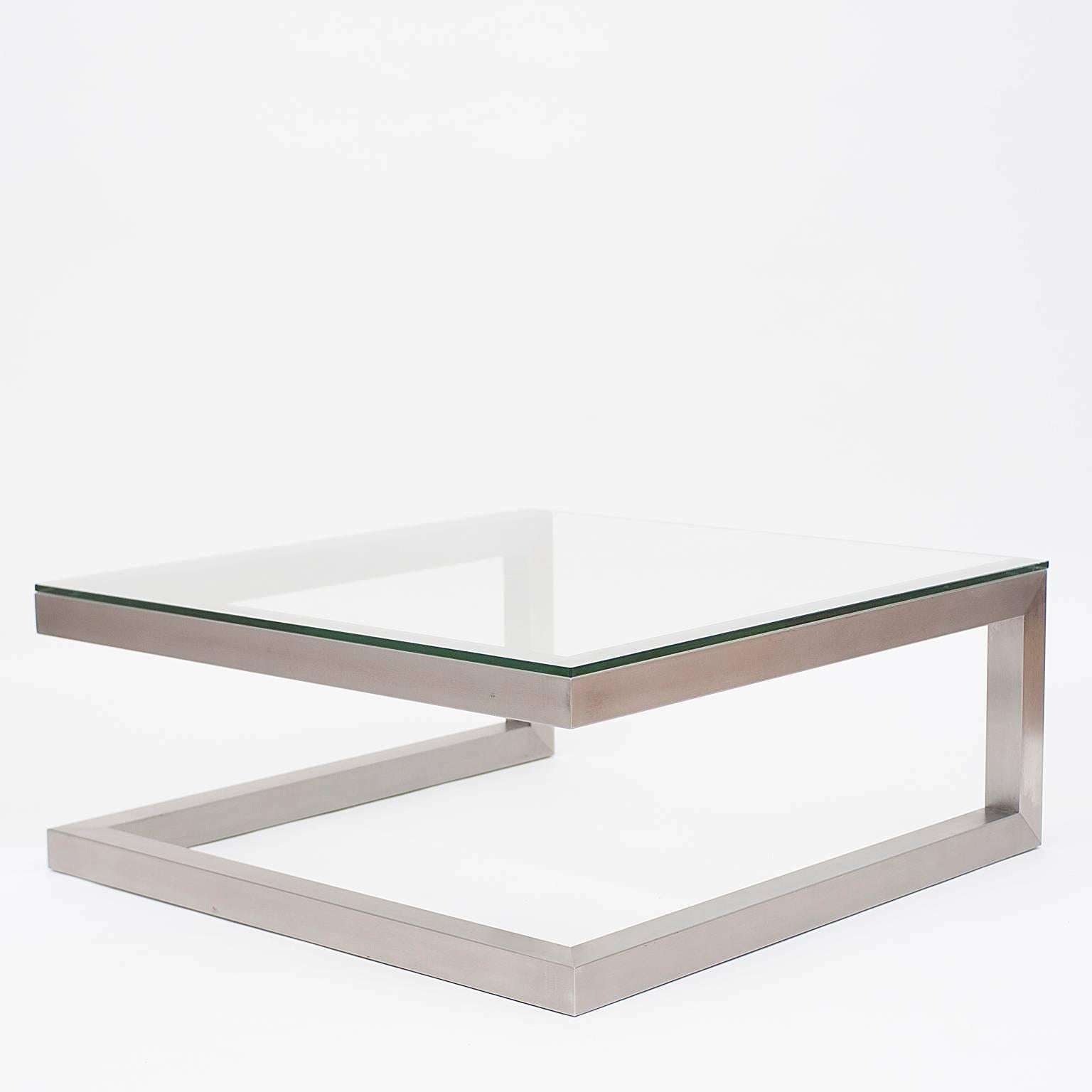 Steel and glass coffee table.