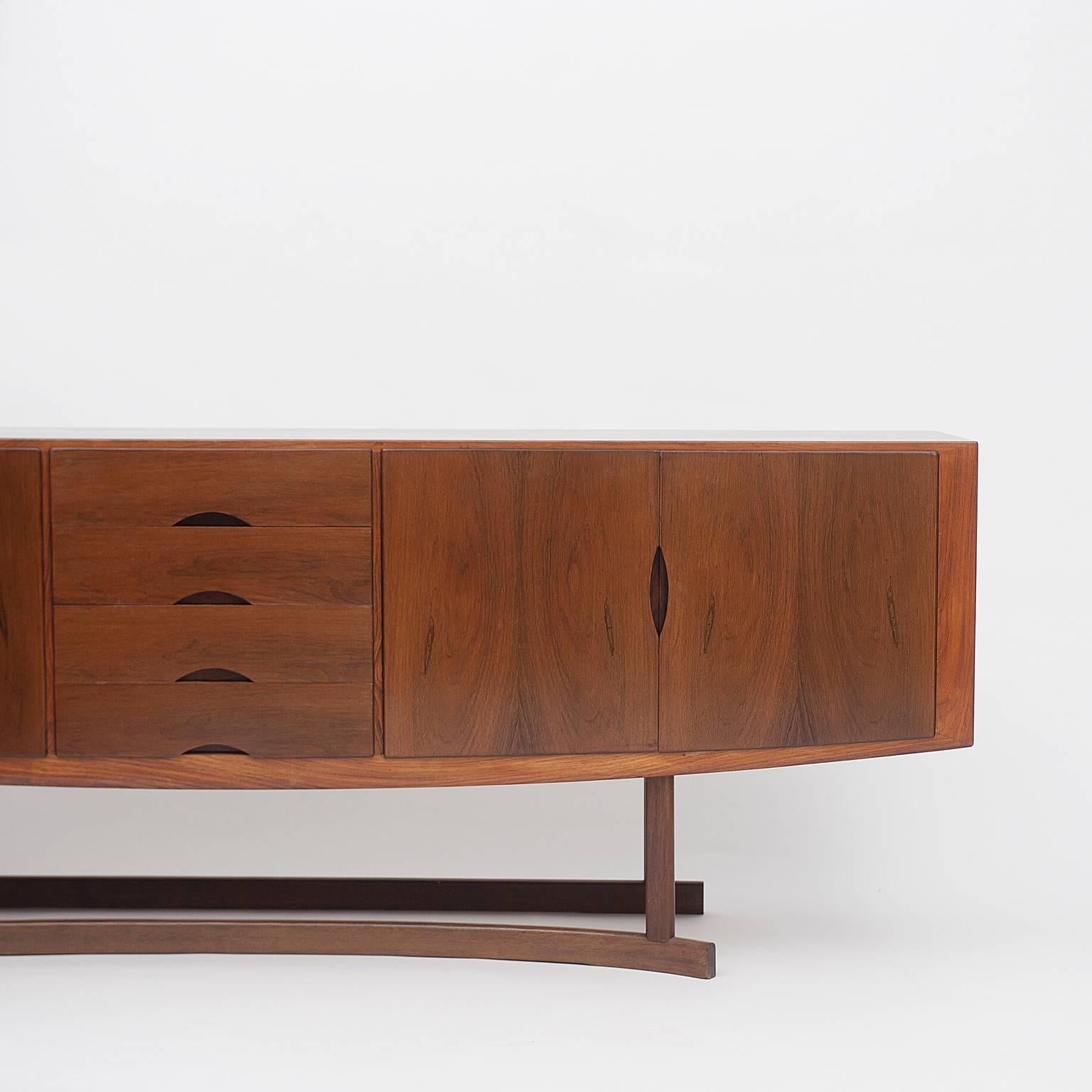 Rare credenza with elegant curves designed by Johannes Andersen of Hans Bech (Model HB 20).