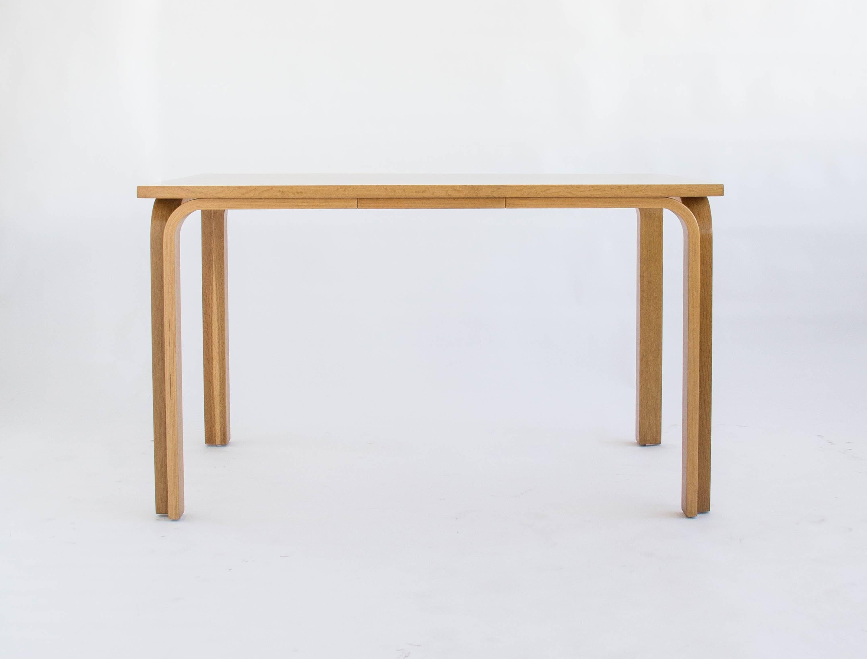 This is a beautiful dining table by Magnus Olesen in Denmark. The birch table top is supported by four bent birch legs. A simple, yet well designed table.

Condition: The table has been professionally refinished.
 