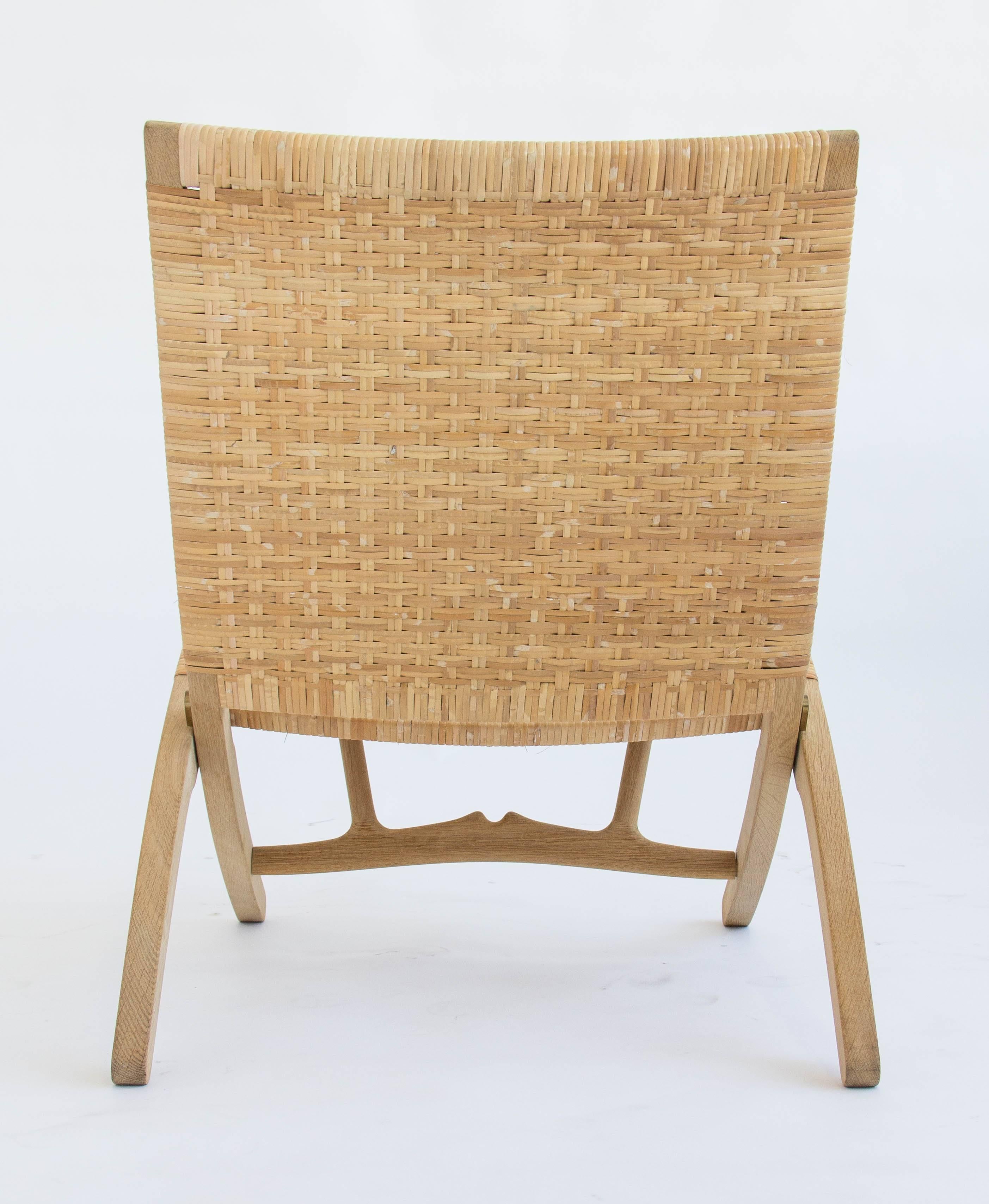 Pair of Hans Wegner Oak and Cane Folding Lounge Chairs  In Excellent Condition In Los Angeles, CA