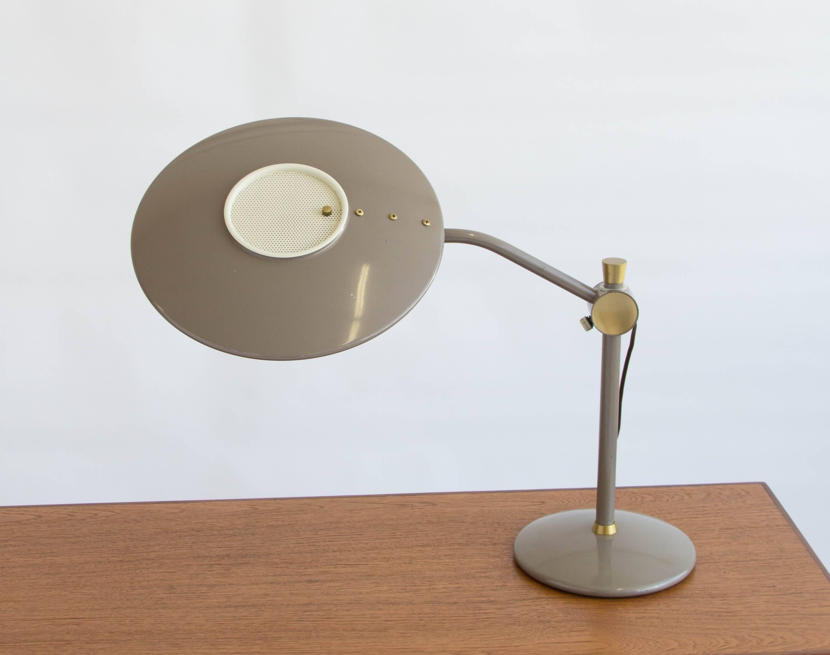 

This Dazor desk lamp model 2008 is a 