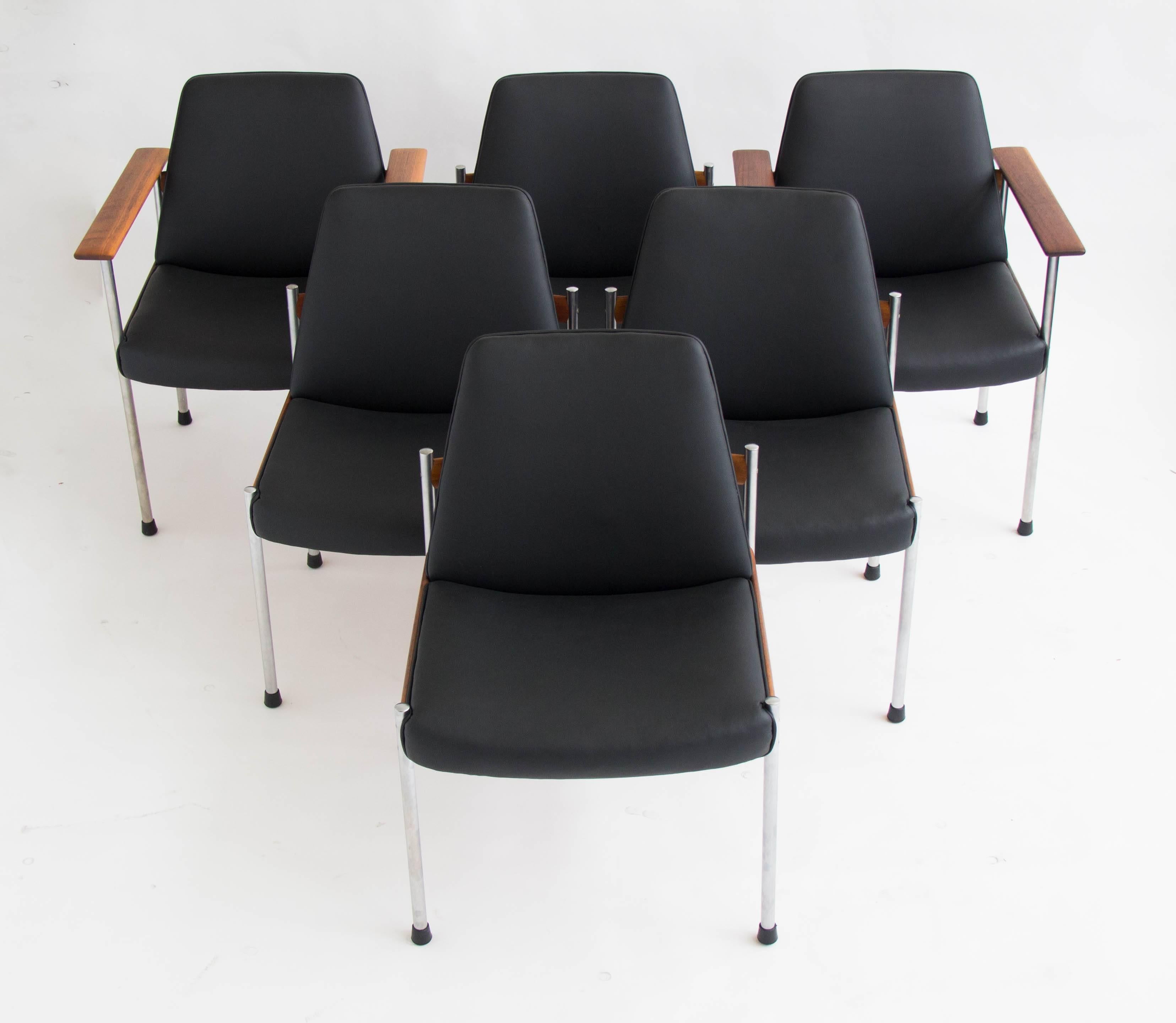This is the third iteration or “3001” series of Dysthe’s popular conference group for Dokka Møbler of Oslo, produced from 1960-1961. The set has six matching chairs with a metal frame, teak crossbars and leather seat and backrest. Includes two