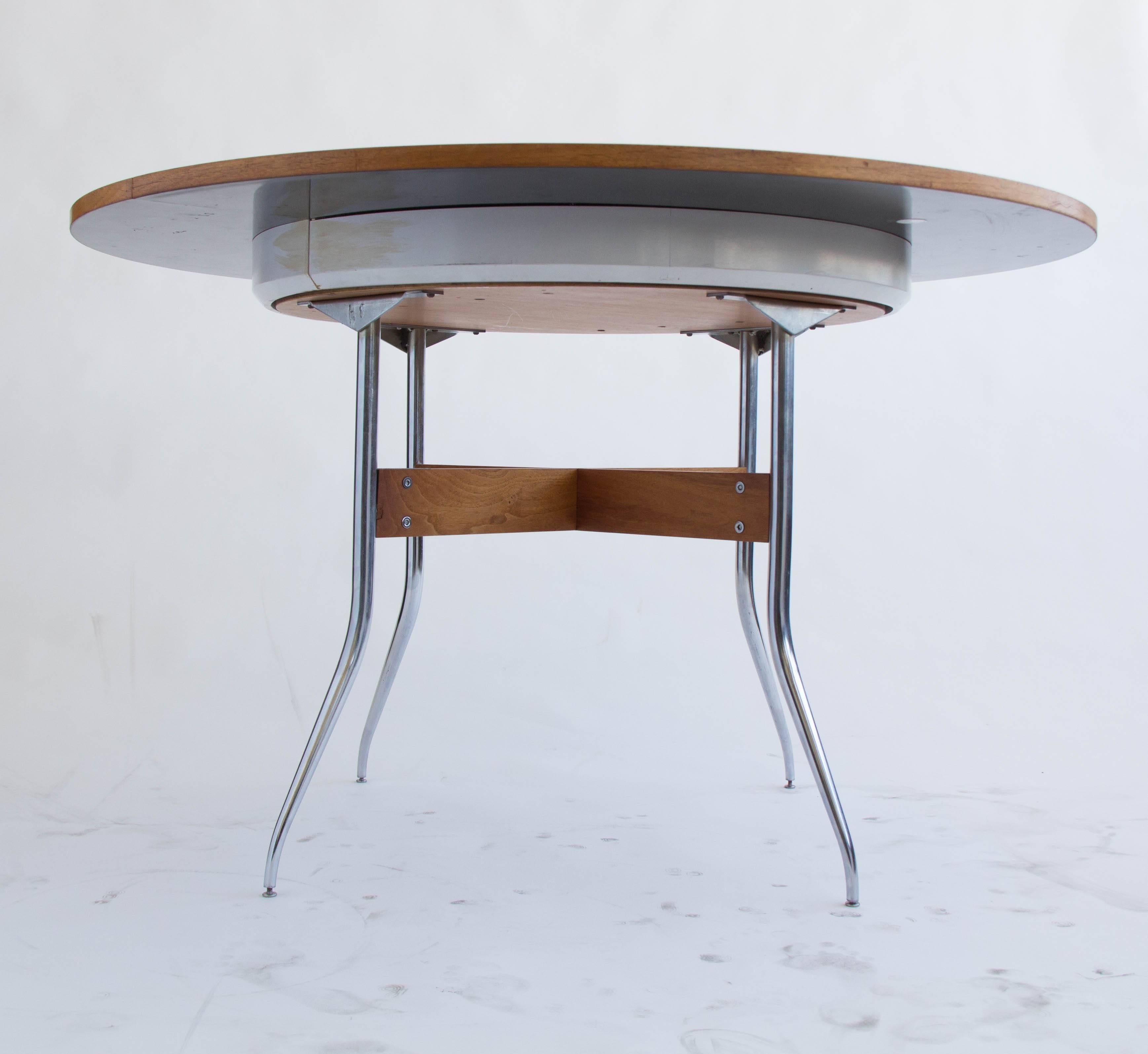 nelson swag leg dining table