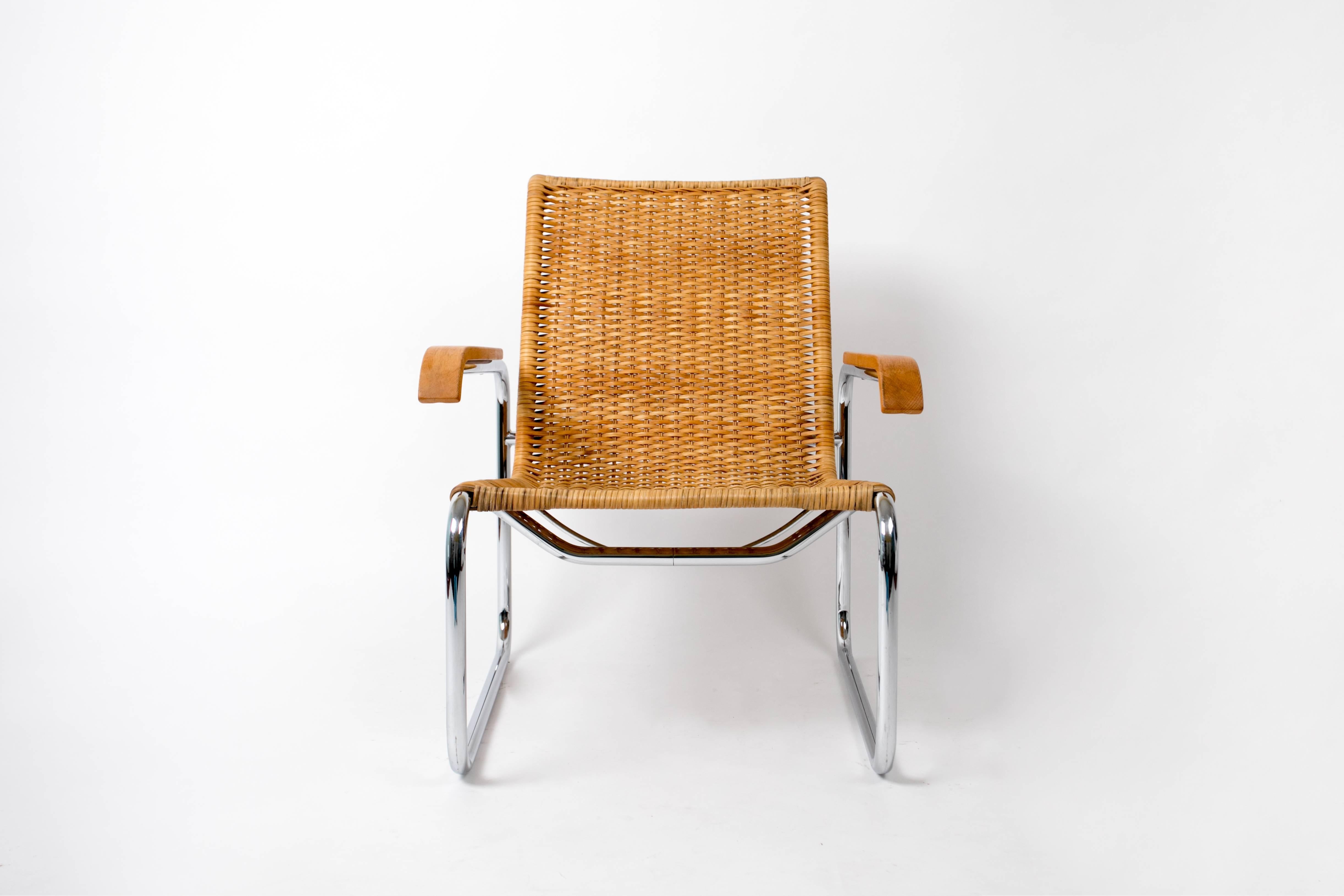 An original Marcel Breuer B35 lounge chair. Designed in 1928 and produced by German manufacturer Thonet, this example has a woven rattan seat. Other variants have included leather cushion or sling upholstery. The seat 'floats' in a chrome frame with