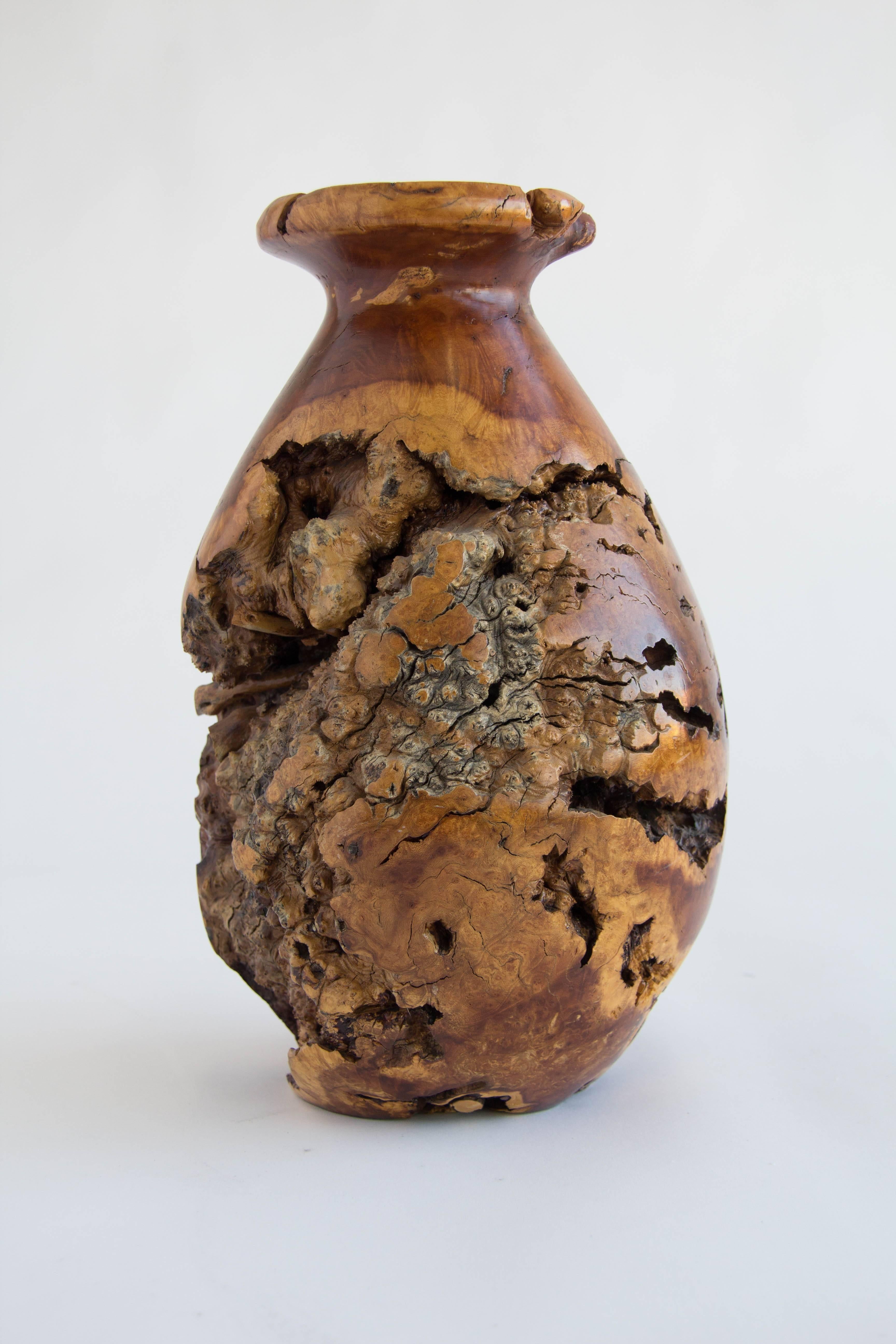 Large burl vase signed by unknown artist.