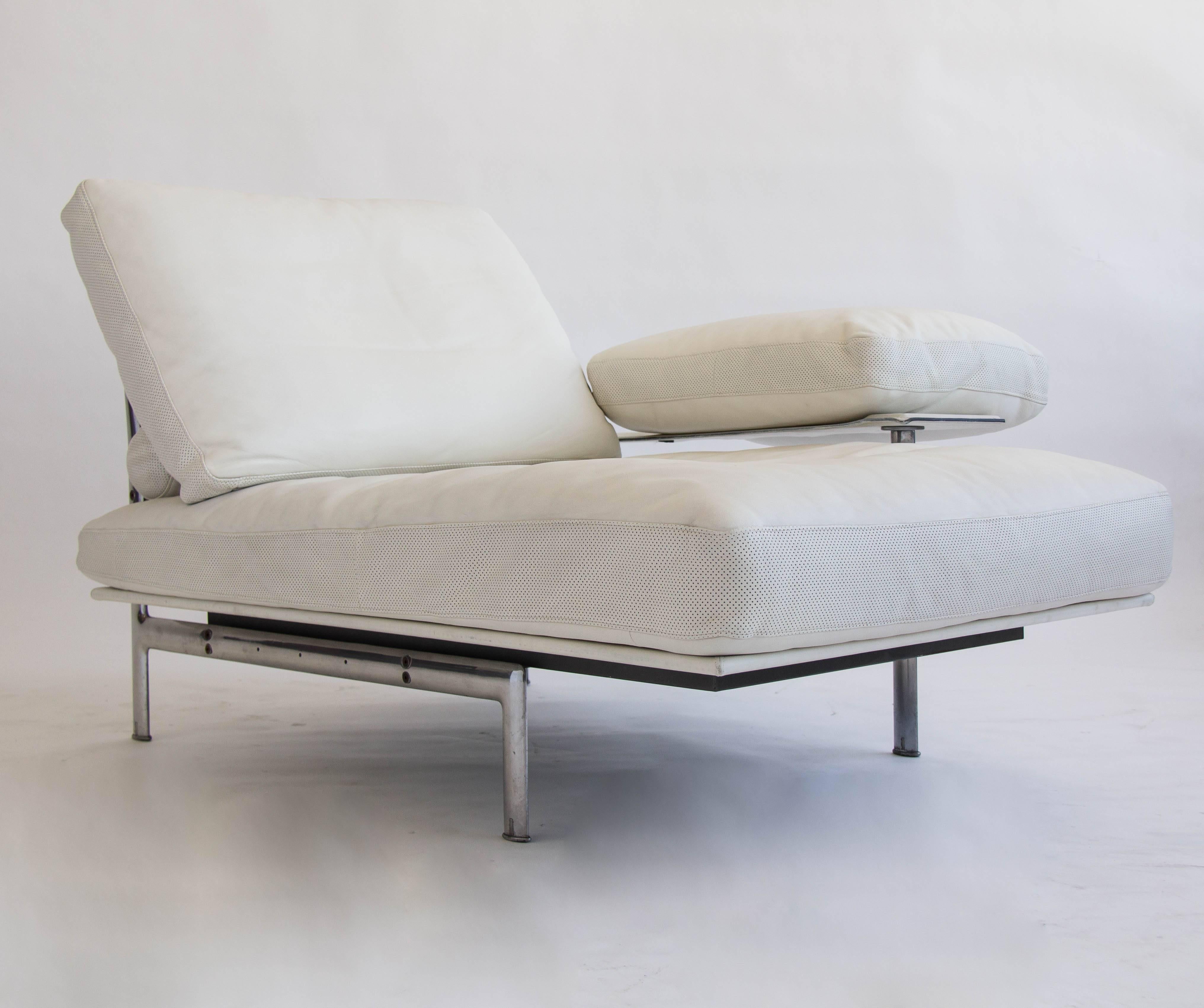 Classic design by Antonio Citterio for B&B Italia in 1979. Each piece has a brushed aluminum frame and feet. The white leather cushions and support pillows have been professionally restored, and all cushions are trimmed with a detail in matching