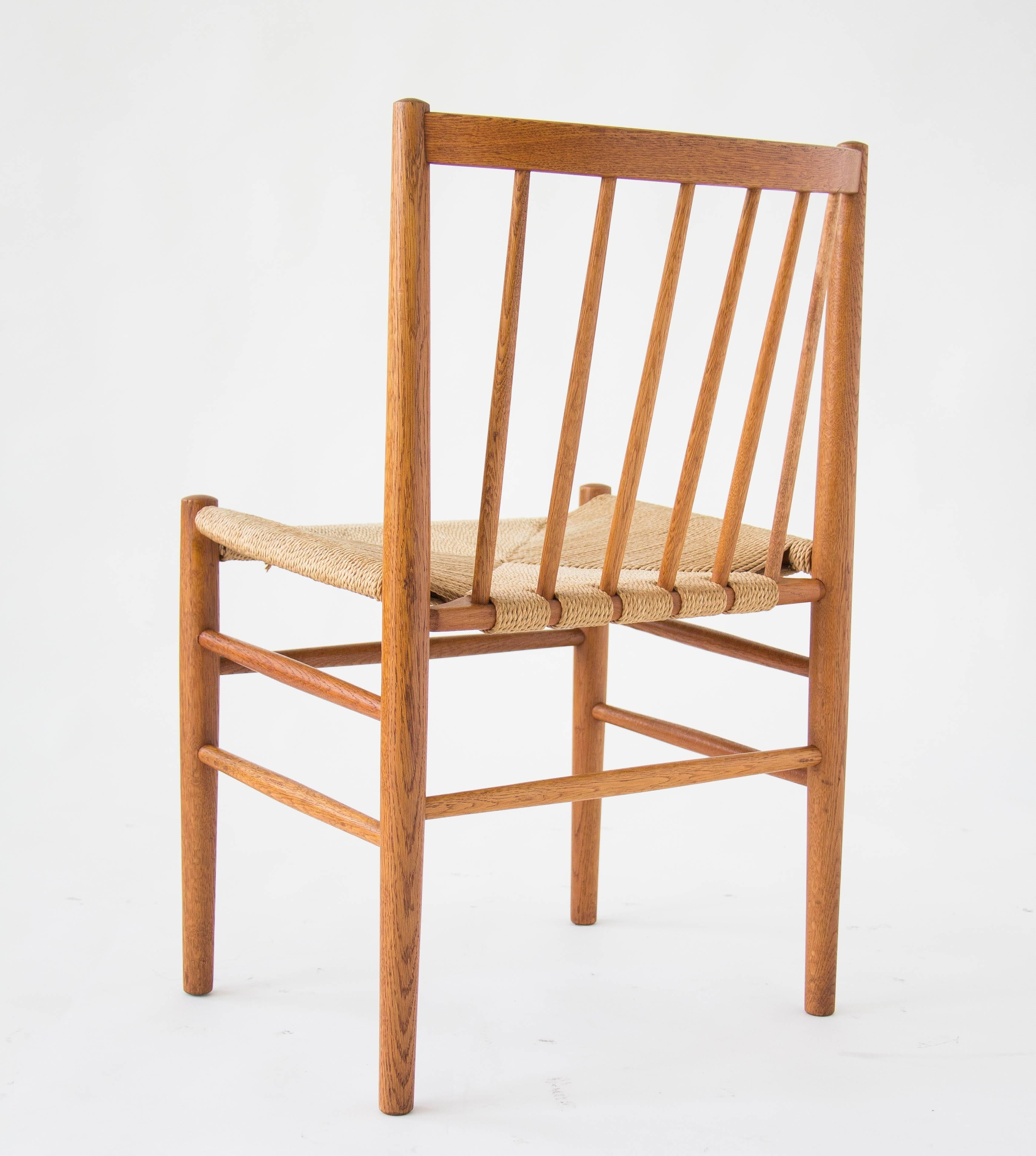 Six Spindle-Backed Oak and Danish Cord Dining Chairs In Good Condition In Los Angeles, CA
