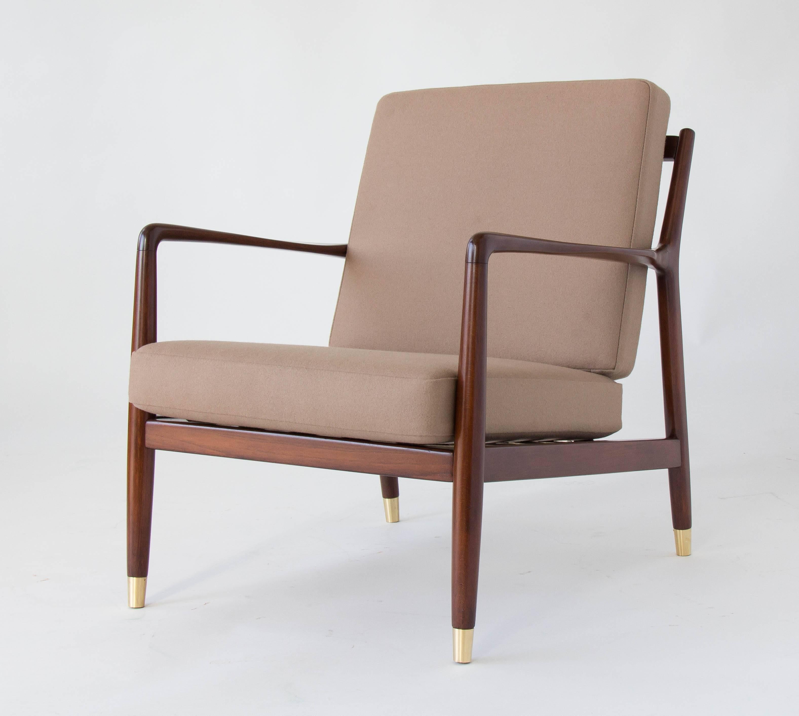 Polished Pair of Lounge Chairs with Brass-Capped Legs by Folke Ohlsson for DUX