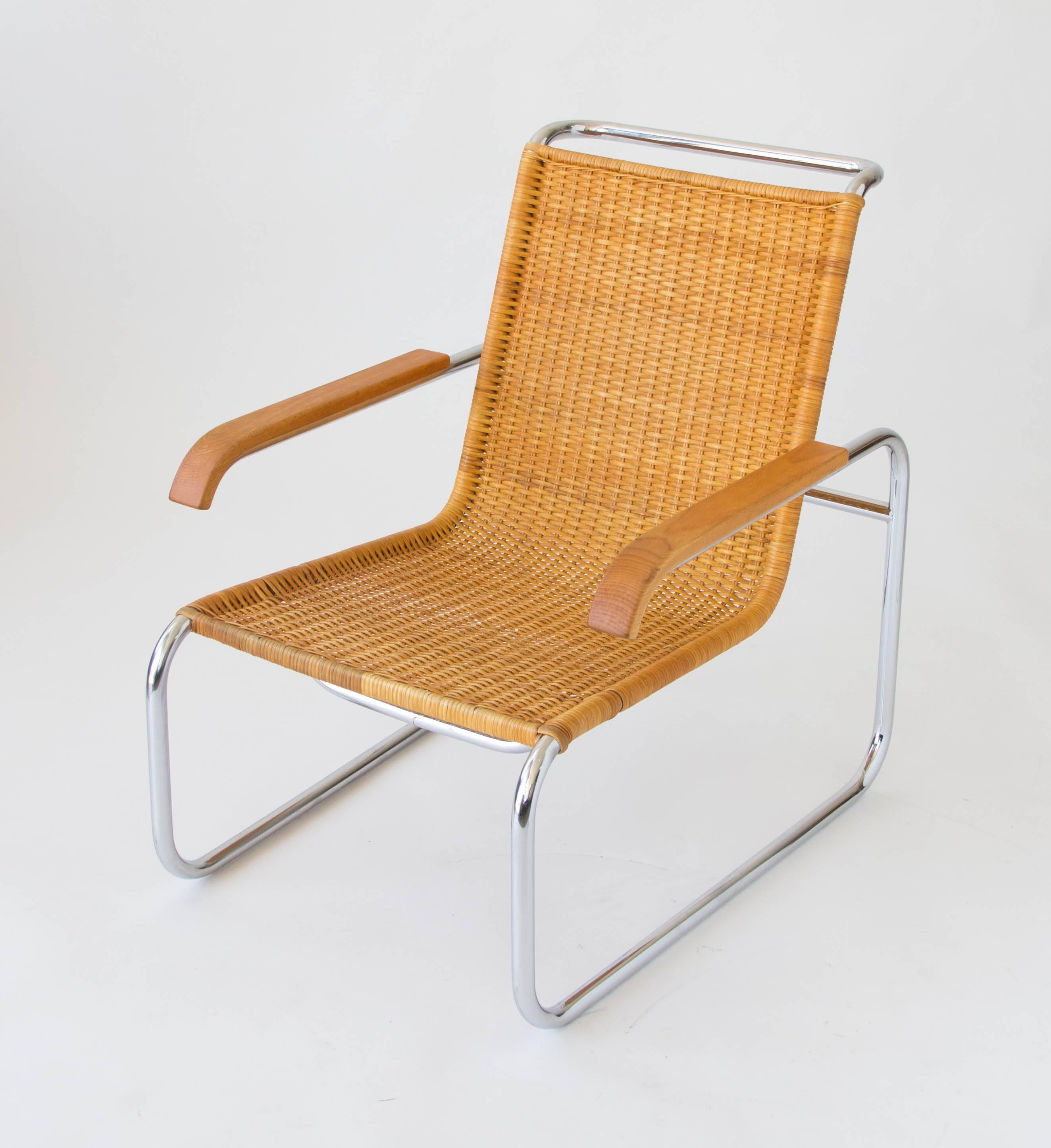 An original Marcel Breuer B35 lounge chair. Designed in 1928 and produced by German manufacturer Thonet, this example has a woven rattan seat. Other variants have included leather cushion or sling upholstery. The seat 'floats' in a chrome frame with