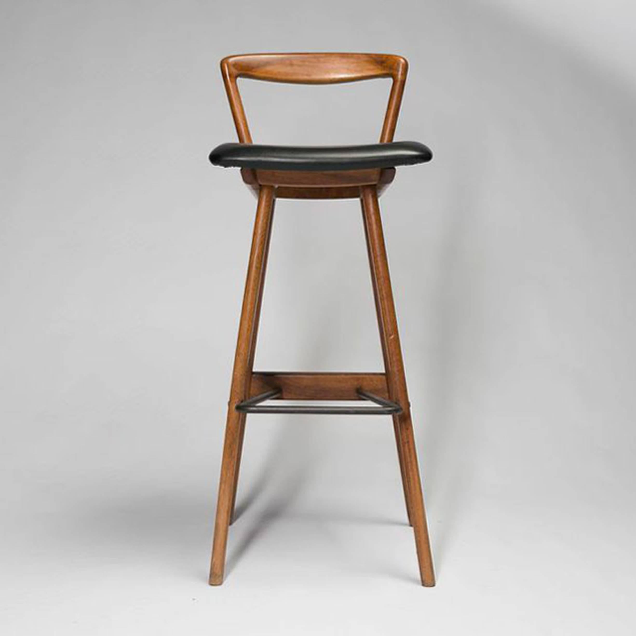 Pair of beautiful sculptured solid teak wood constructed barstools by Rosengren Hansen for Brande Møbelfabrik. Great lines and modern elegance make these barstools a perfect pair for any space. The high back rest provides great comfort.