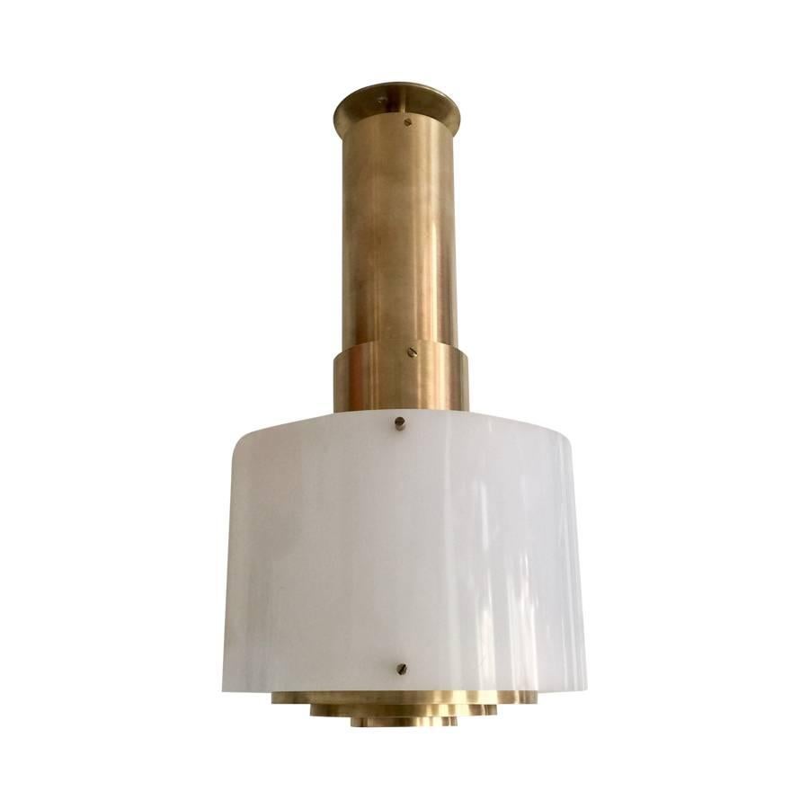 Impressive manufacturing quality set of Danish pendant in massive brass with plexiglass shade.
Heavy brass body with turn hook attachment reminding of Louis Poulsen productions.
In perfect vintage shape.
Original feature: Top plate is made to