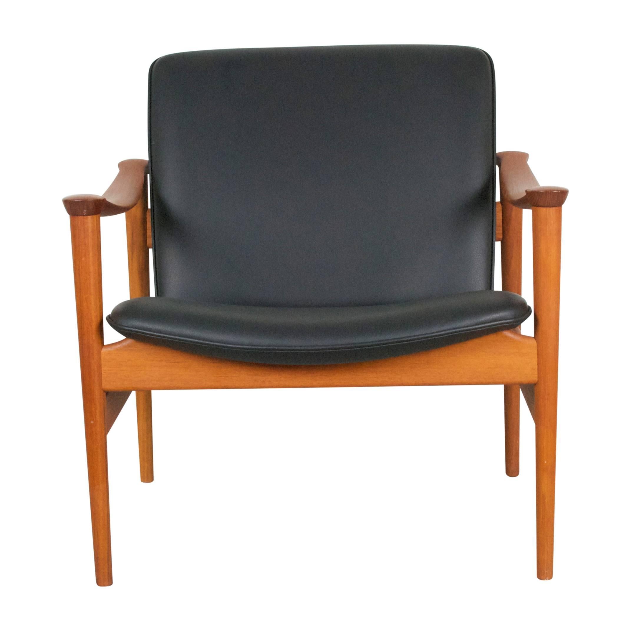 Rare Fredrik A.Kayser Armchair model 711. This Model was manufactured probably in the late 70s still in teak. Its unused and in perfect condition reupholstered at the Manufacturer in Norway. 